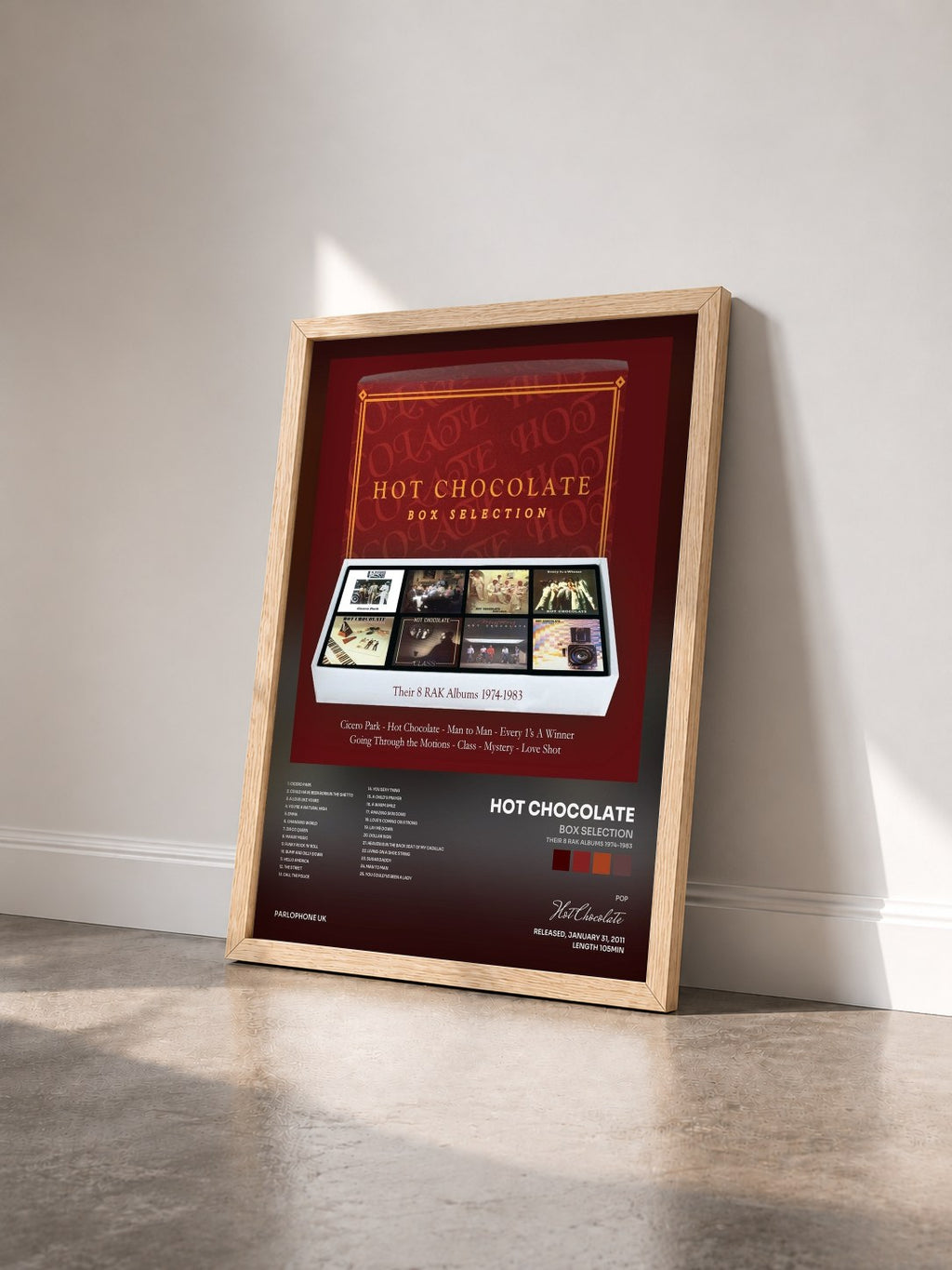 #bois Tableau de l'album Box Selection (Their 8 RAK Albums 1974-1983) de Hot Chocolate vu de trois quarts, cadre en bois brut