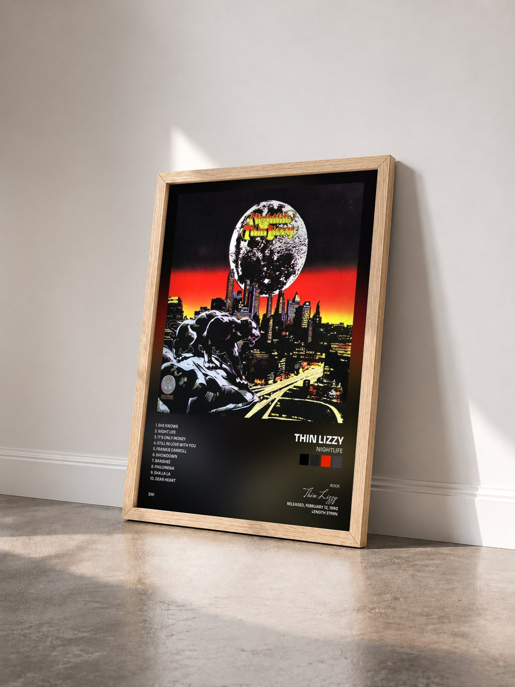#bois Tableau de l'album Nightlife de Thin Lizzy vu de trois quarts, cadre en bois brut