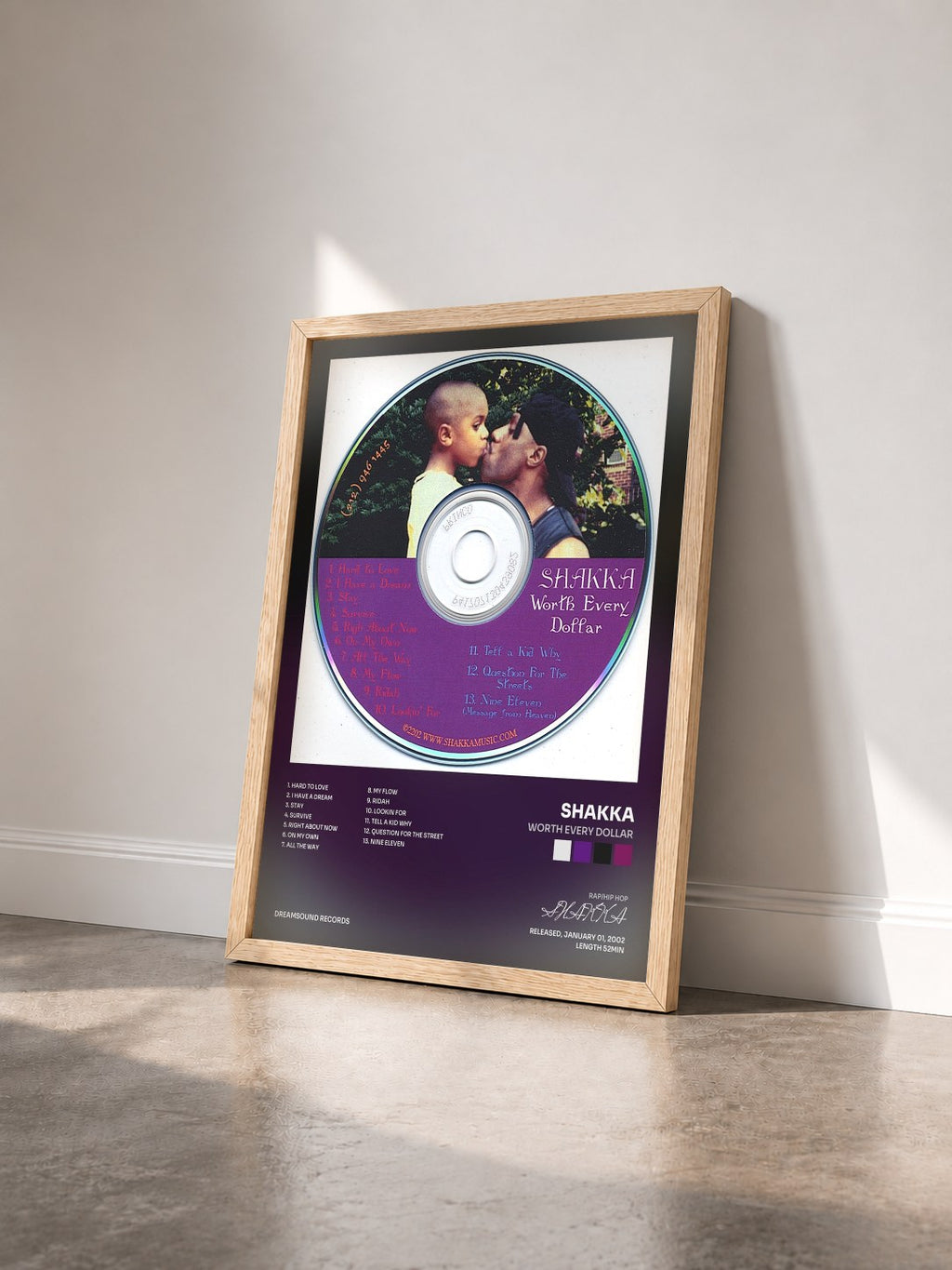 #bois Tableau de l'album Worth Every Dollar de SHAKKA vu de trois quarts, cadre en bois brut