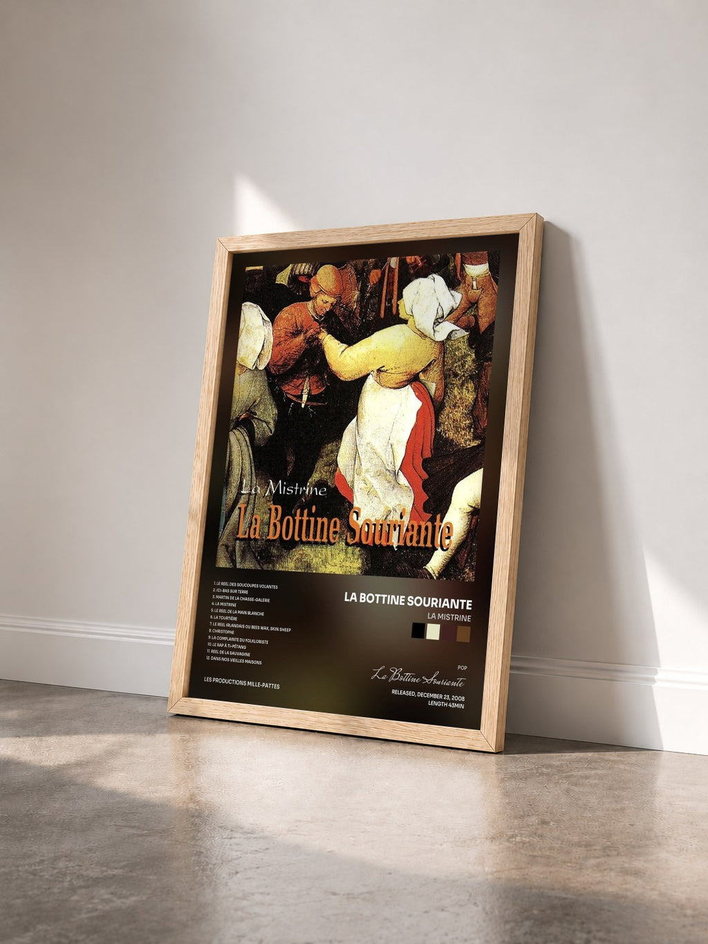 #bois Tableau de l'album La Mistrine de La Bottine Souriante vu de trois quarts, cadre en bois brut