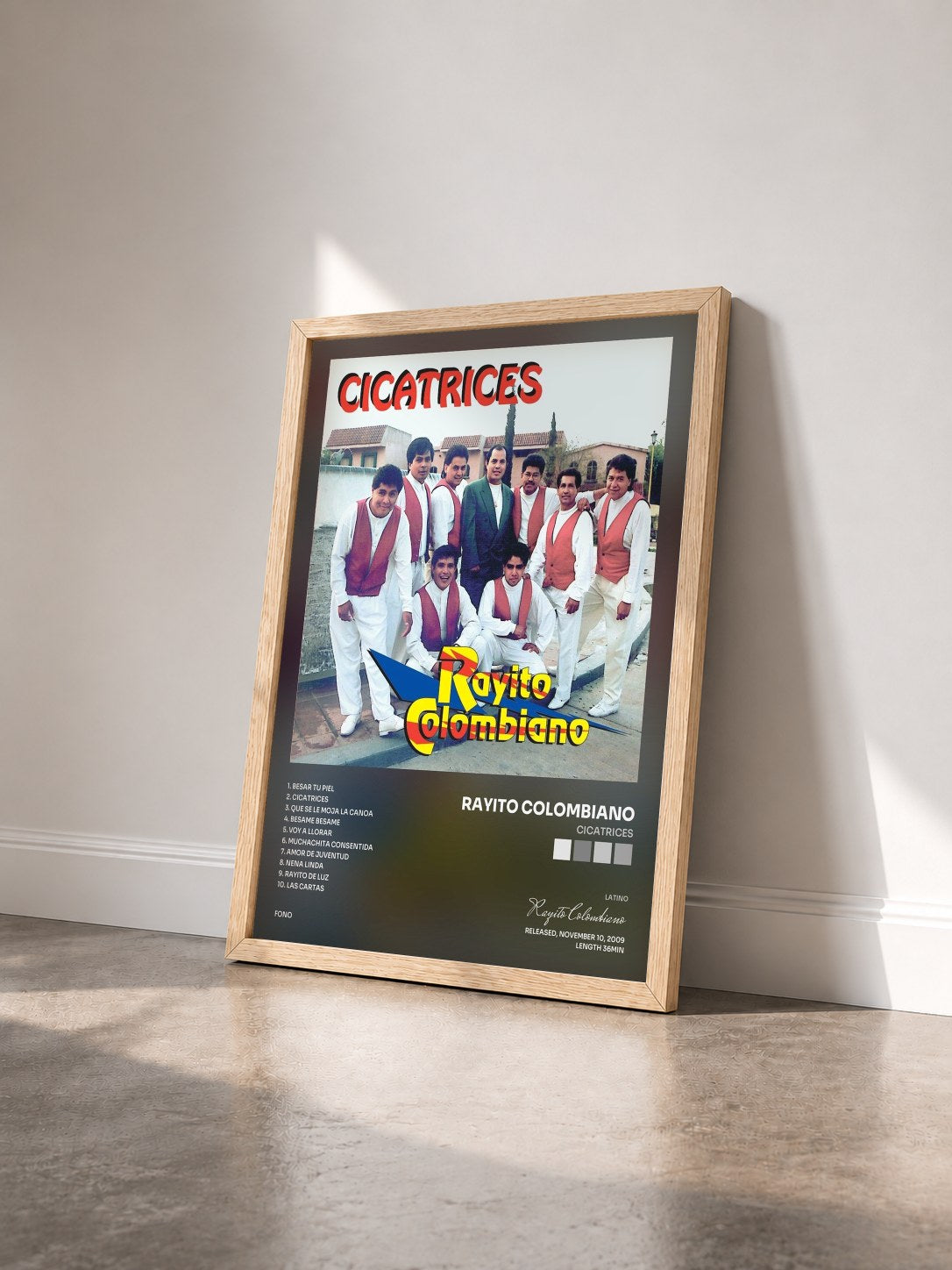 #bois Tableau de l'album Cicatrices de Rayito Colombiano vu de trois quarts, cadre en bois brut
