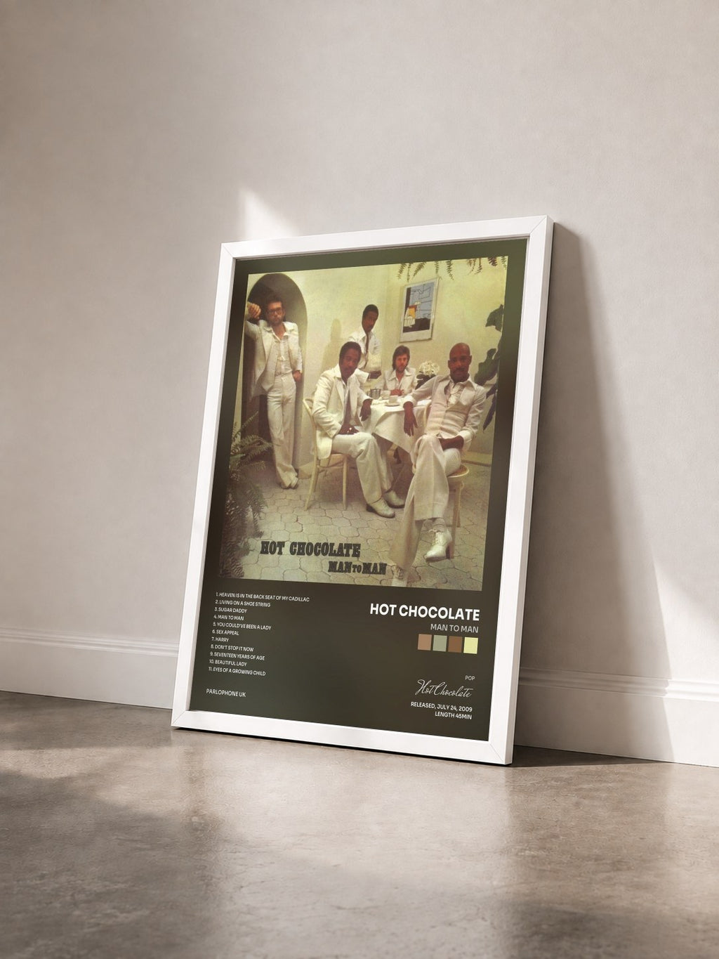 #blanc Tableau de l'album Man to Man de Hot Chocolate vu de trois quarts, cadre blanc