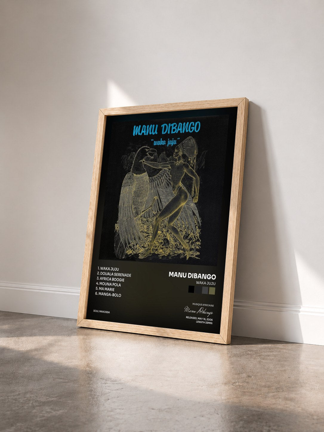 #bois Tableau de l'album Waka Juju de Manu Dibango vu de trois quarts, cadre en bois brut
