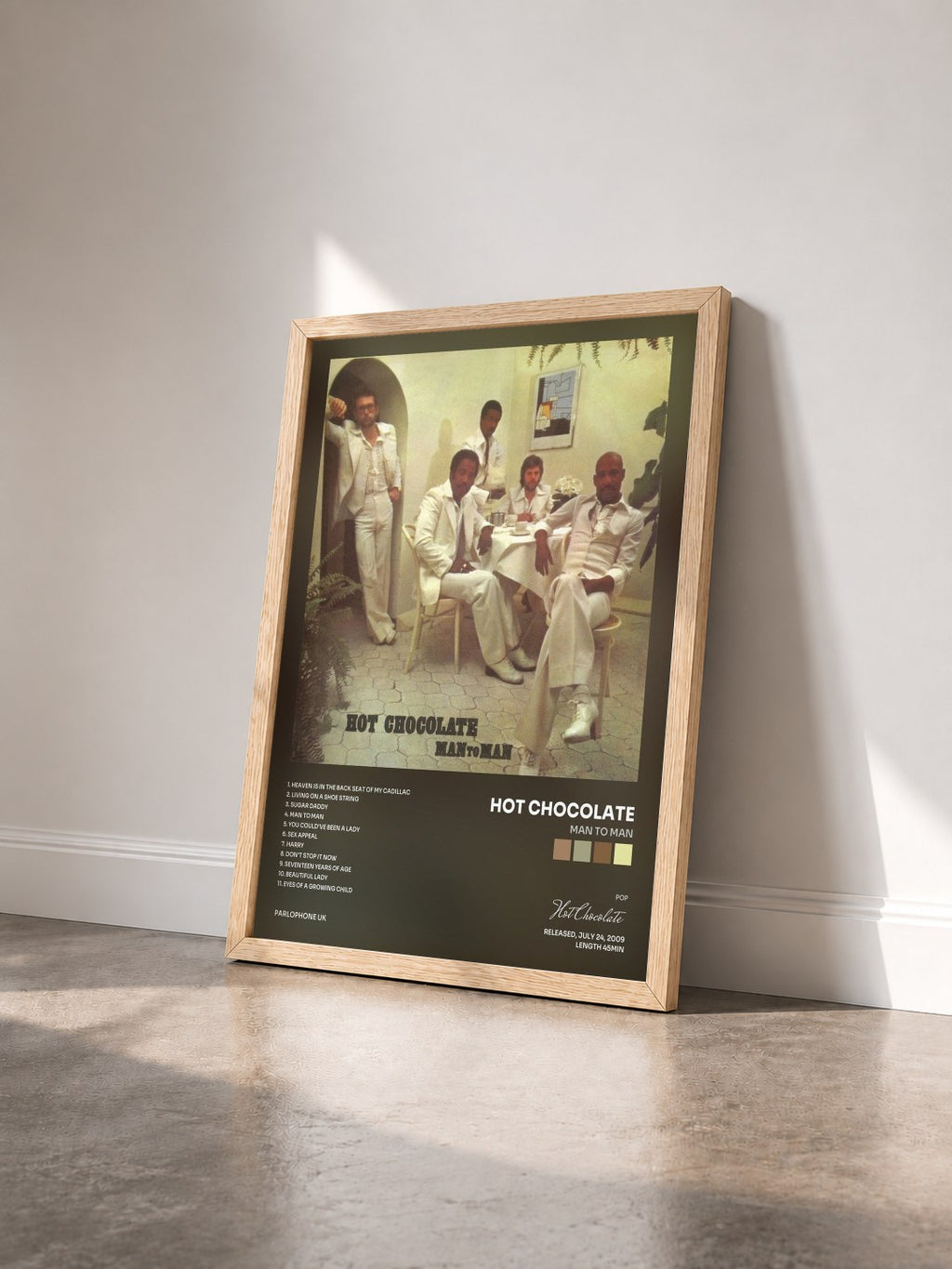 #bois Tableau de l'album Man to Man de Hot Chocolate vu de trois quarts, cadre en bois brut