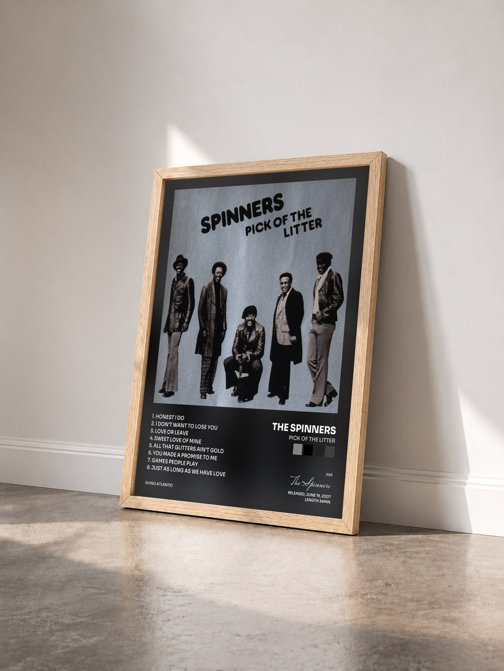 #bois Tableau de l'album Pick of the Litter de The Spinners vu de trois quarts, cadre en bois brut