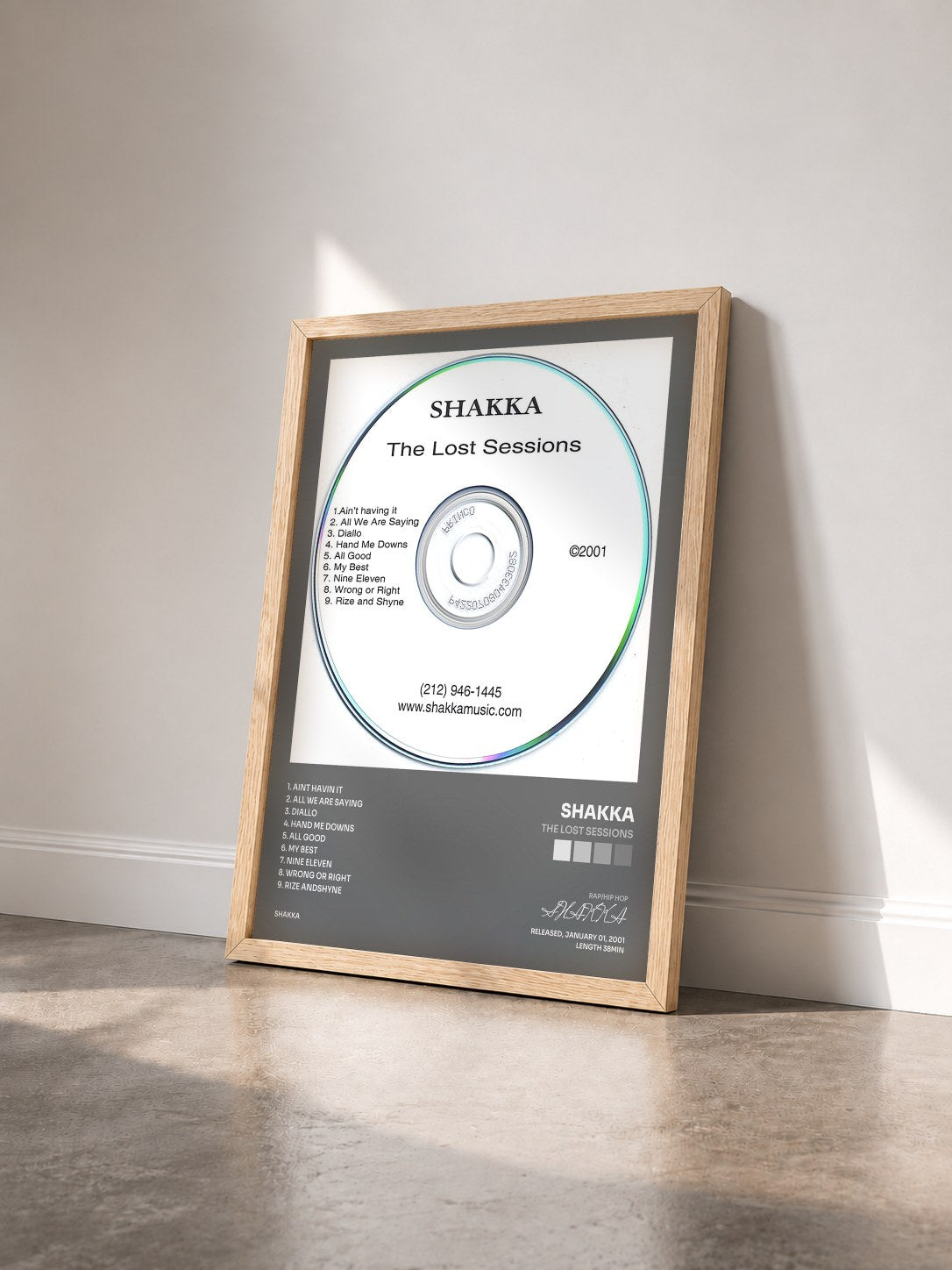 #bois Tableau de l'album The Lost Sessions de SHAKKA vu de trois quarts, cadre en bois brut