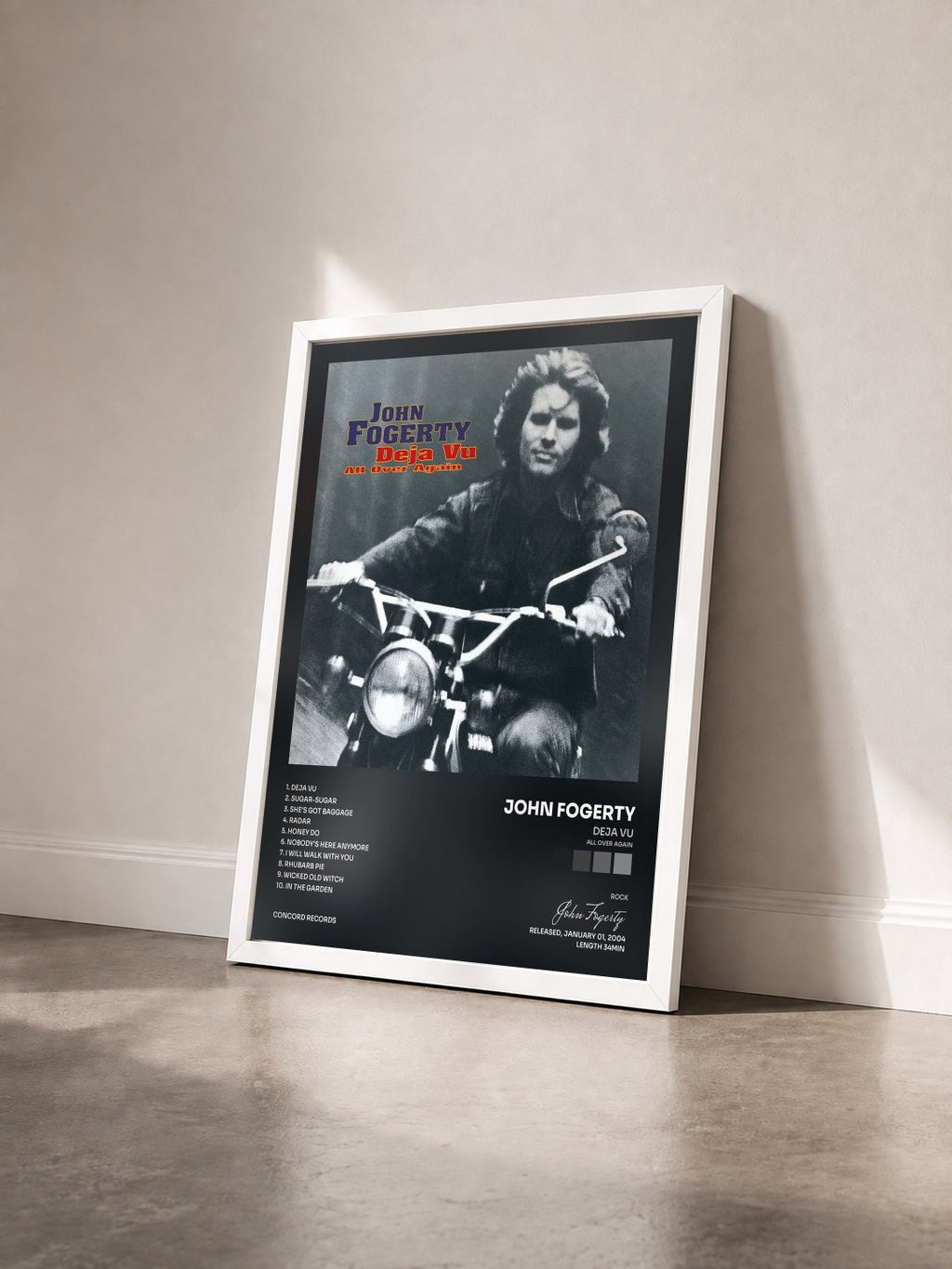 #blanc Tableau de l'album Deja Vu (All Over Again) de John Fogerty vu de trois quarts, cadre blanc
