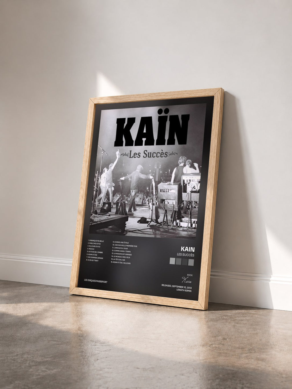 #bois Tableau de l'album Les Succès de Kain vu de trois quarts, cadre en bois brut