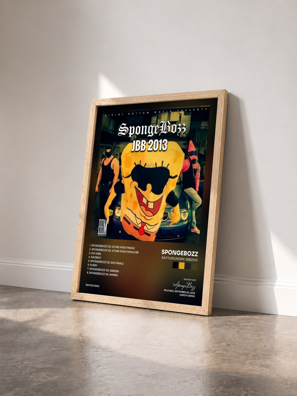 #bois Tableau de l'album Battlerunden JBB2013 de SpongeBozz vu de trois quarts, cadre en bois brut