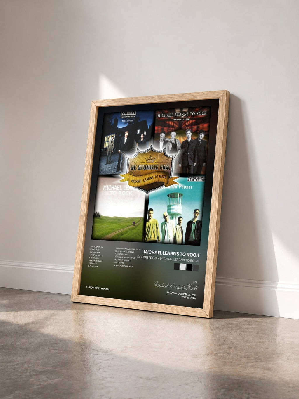 #bois Tableau de l'album De Første Fra - Michael Learns to Rock de Michael Learns to Rock vu de trois quarts, cadre en bois brut
