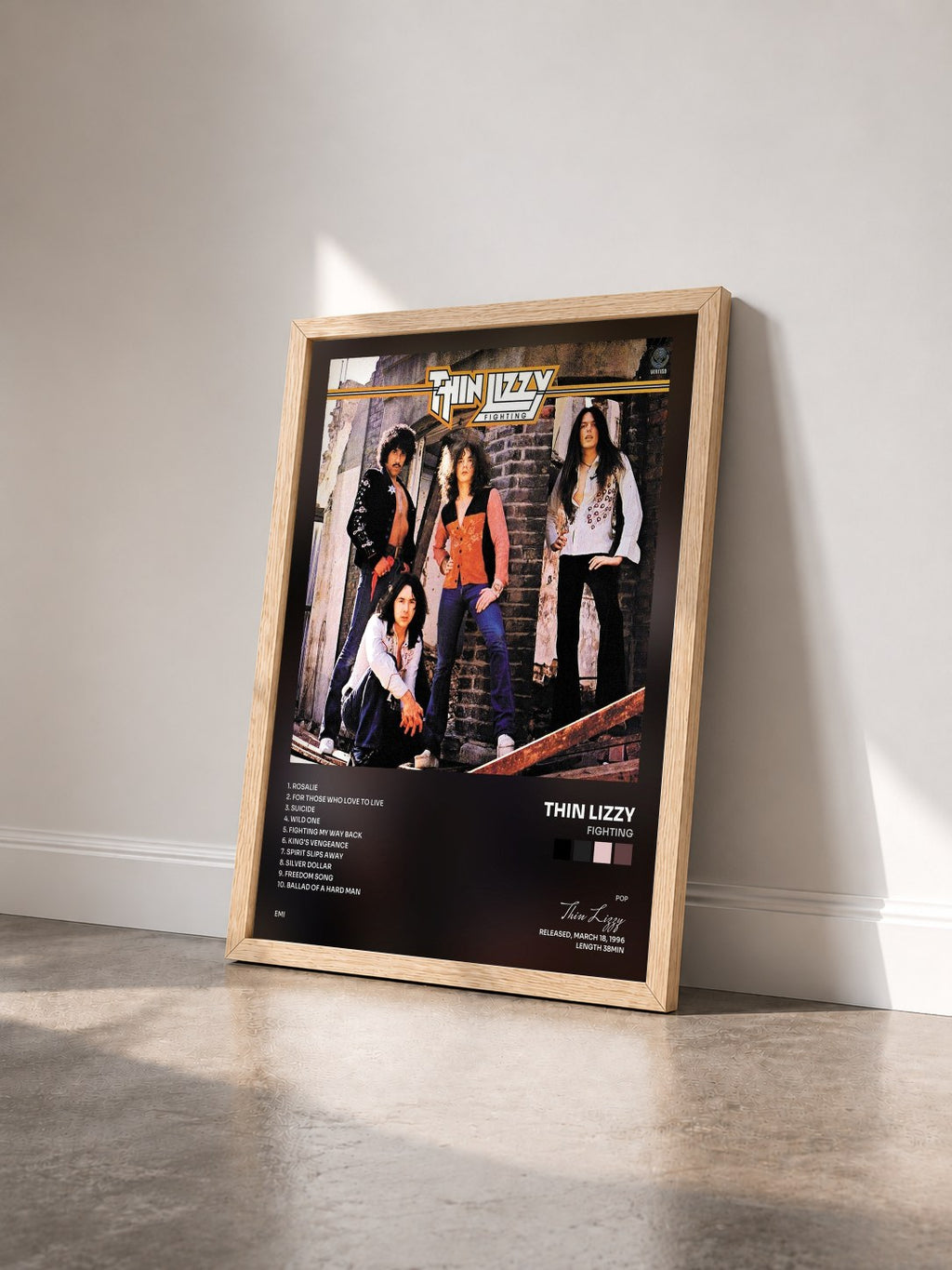 #bois Tableau de l'album Fighting de Thin Lizzy vu de trois quarts, cadre en bois brut