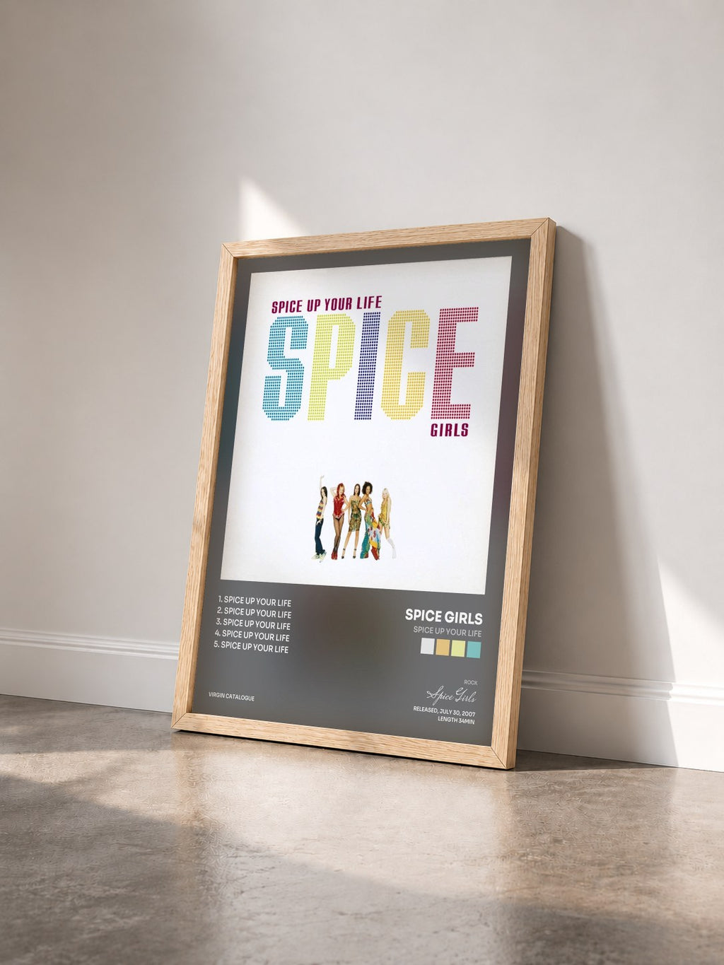 #bois Tableau de l'album Spice Up Your Life de Spice Girls vu de trois quarts, cadre en bois brut