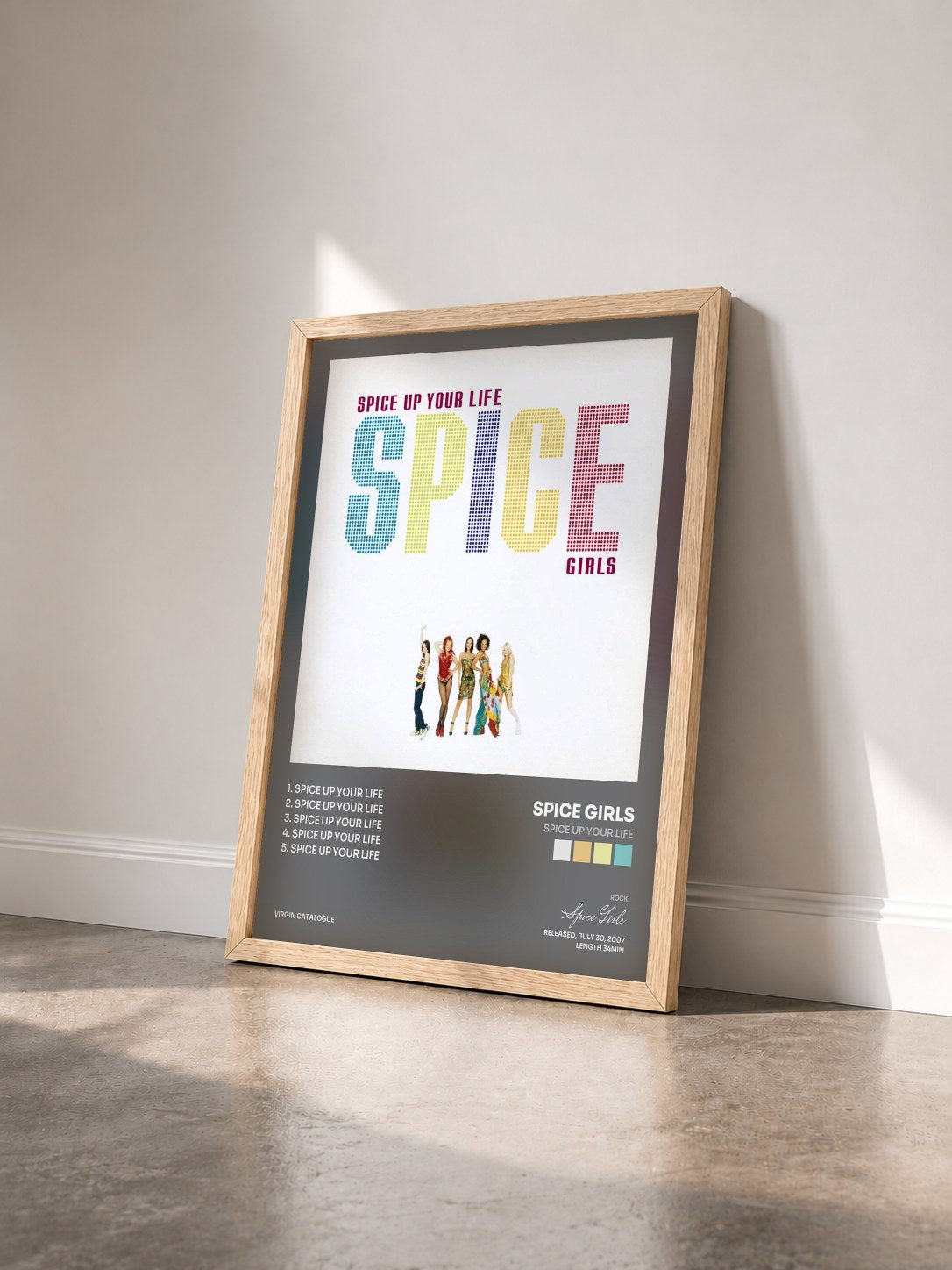 #bois Tableau de l'album Spice Up Your Life de Spice Girls vu de trois quarts, cadre en bois brut