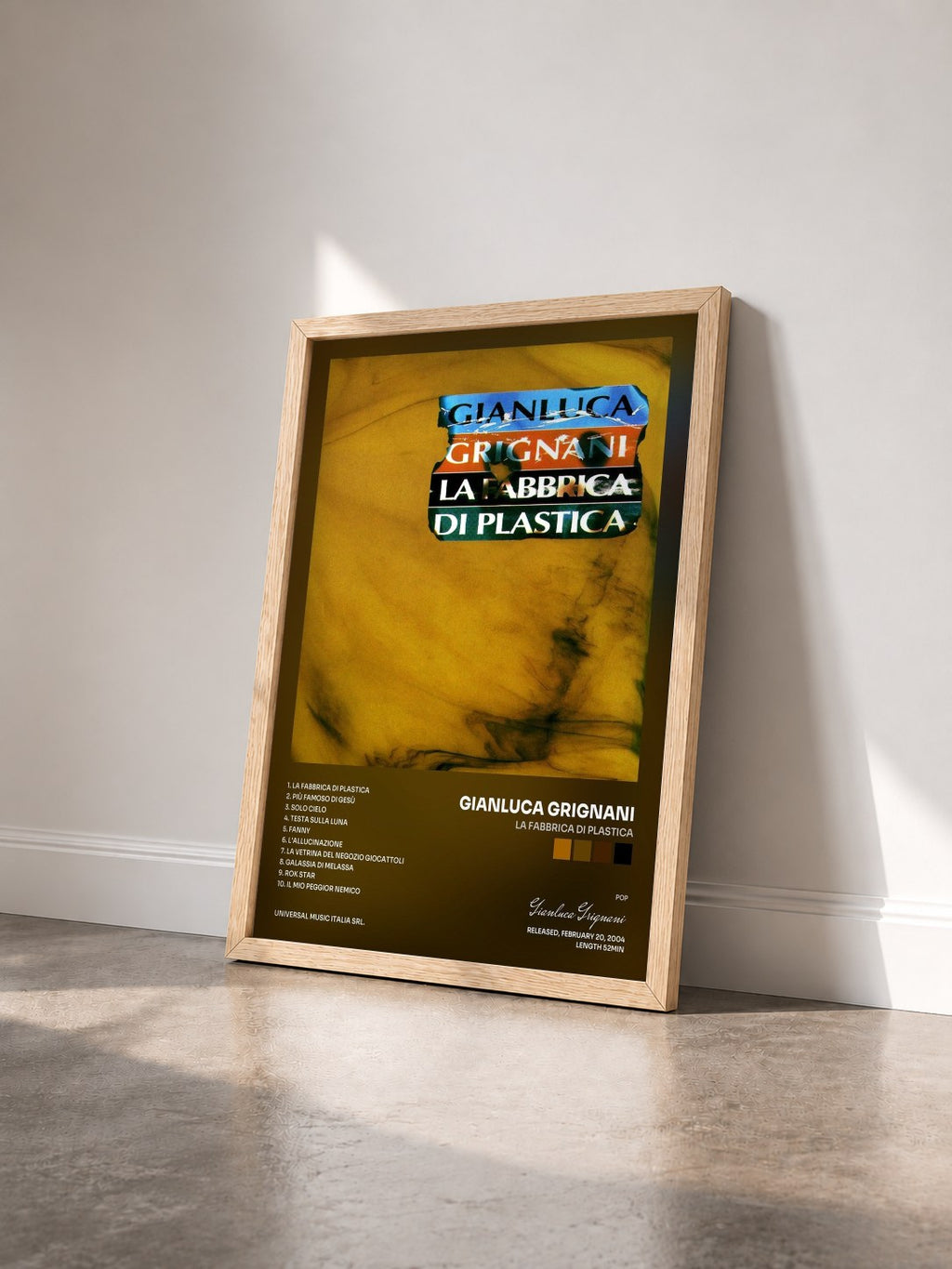 #bois Tableau de l'album La Fabbrica Di Plastica de Gianluca Grignani vu de trois quarts, cadre en bois brut
