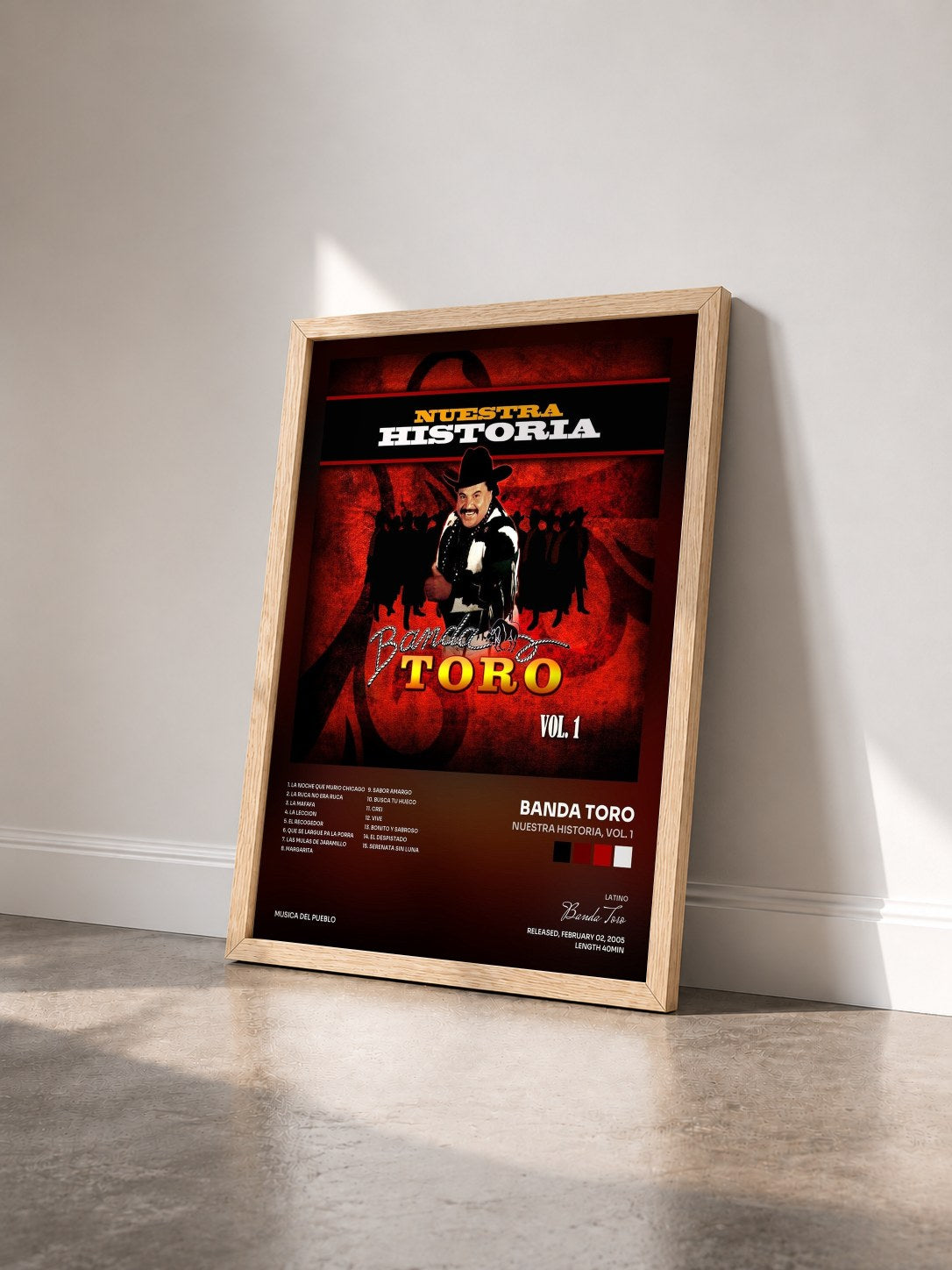 #bois Tableau de l'album Nuestra Historia, Vol. 1 de Banda Toro vu de trois quarts, cadre en bois brut