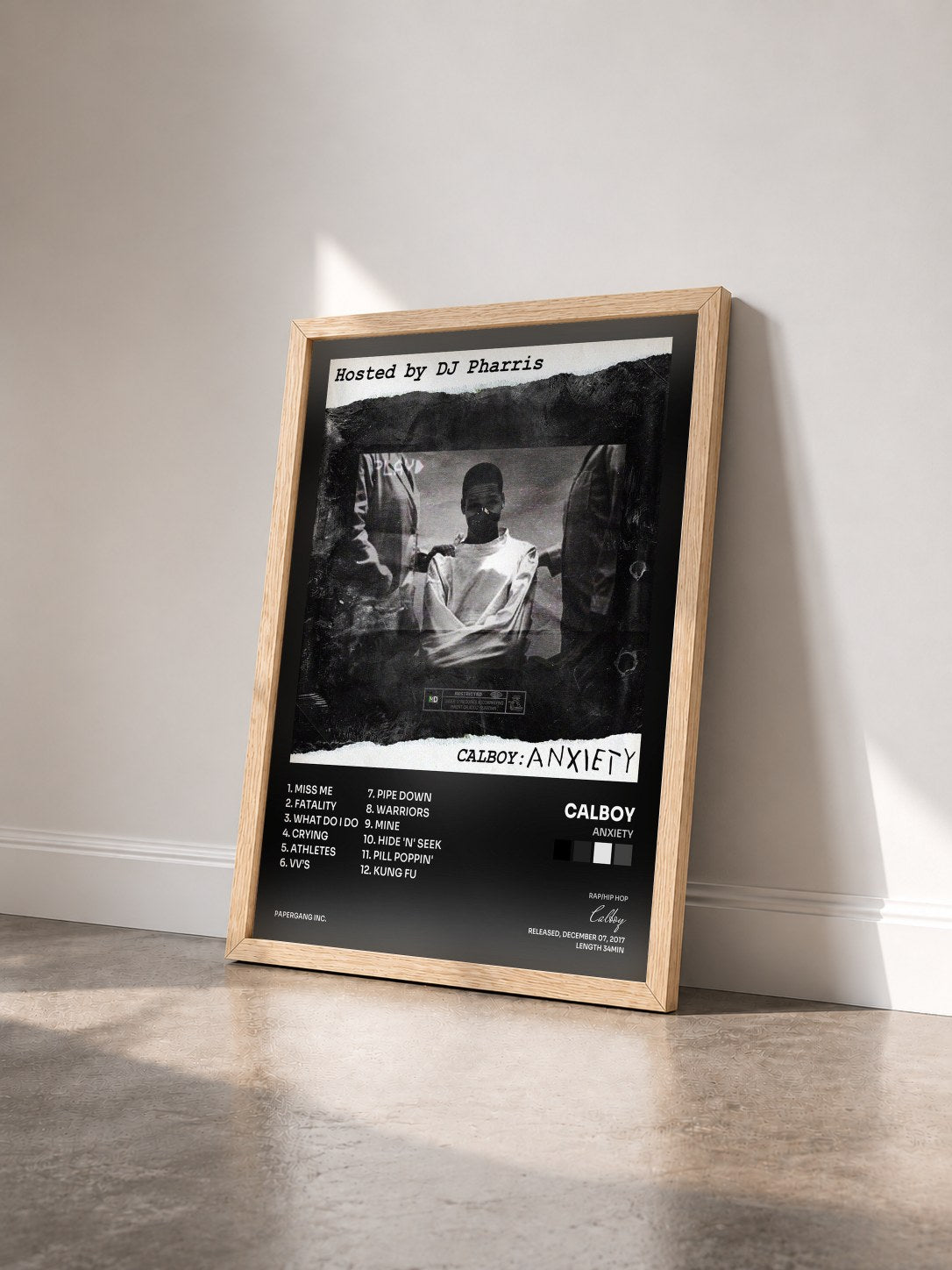 #bois Tableau de l'album Anxiety de Calboy vu de trois quarts, cadre en bois brut