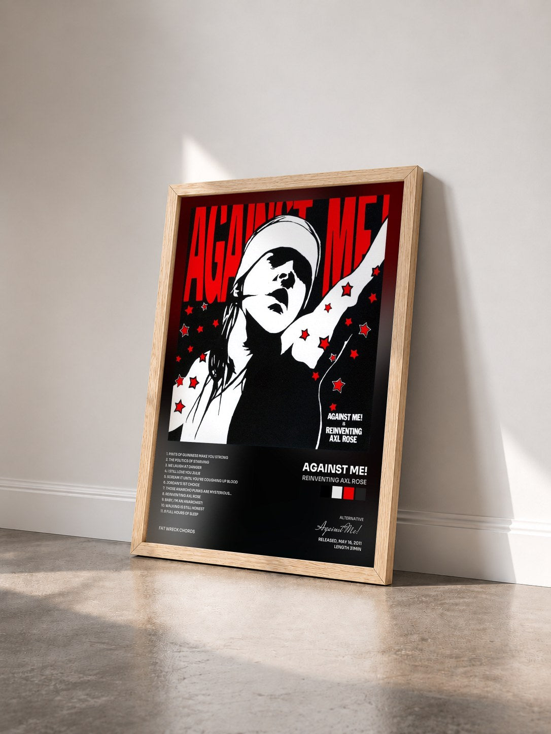 #bois Tableau de l'album Reinventing Axl Rose de Against Me! vu de trois quarts, cadre en bois brut