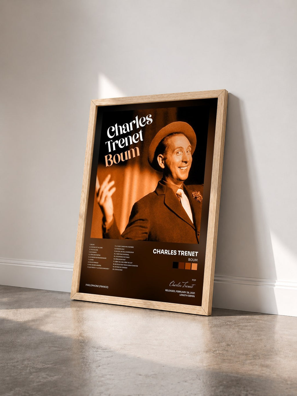 #bois Tableau de l'album Boum de Charles Trenet vu de trois quarts, cadre en bois brut