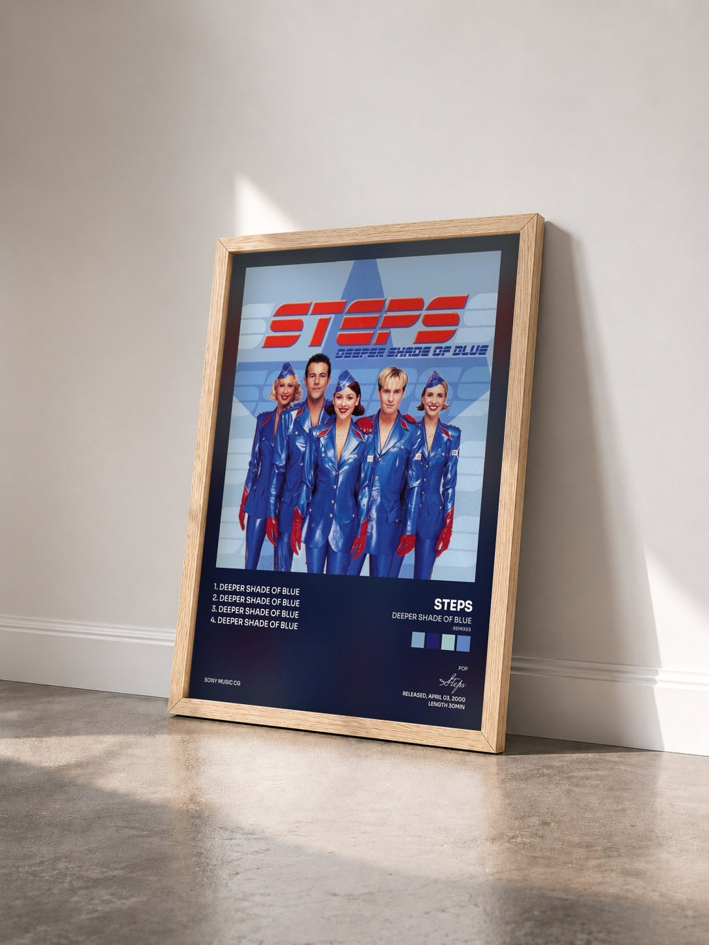 #bois Tableau de l'album Deeper Shade Of Blue (Remixes) de Steps vu de trois quarts, cadre en bois brut