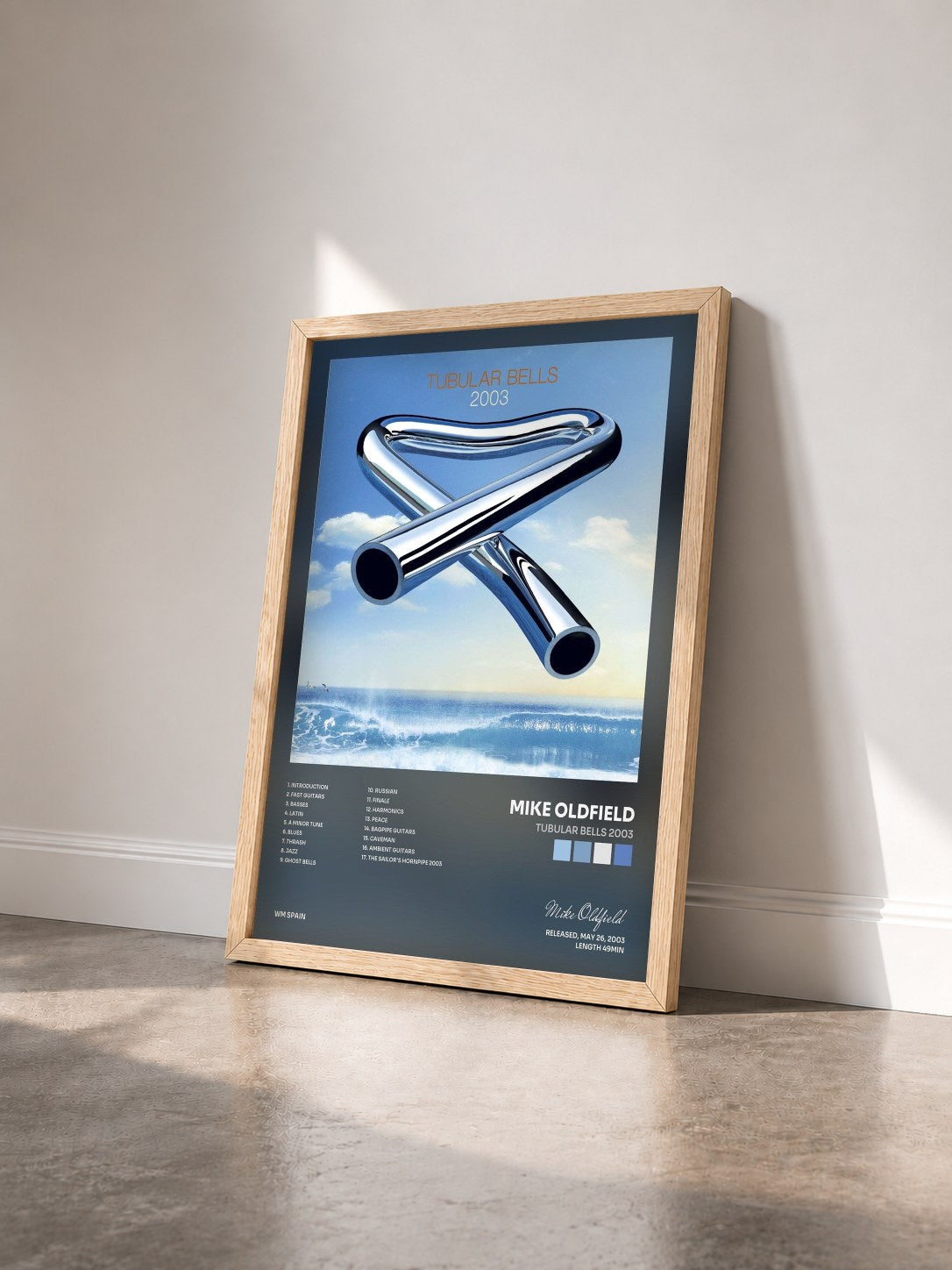 #bois Tableau de l'album Tubular Bells 2003 de Mike Oldfield vu de trois quarts, cadre en bois brut