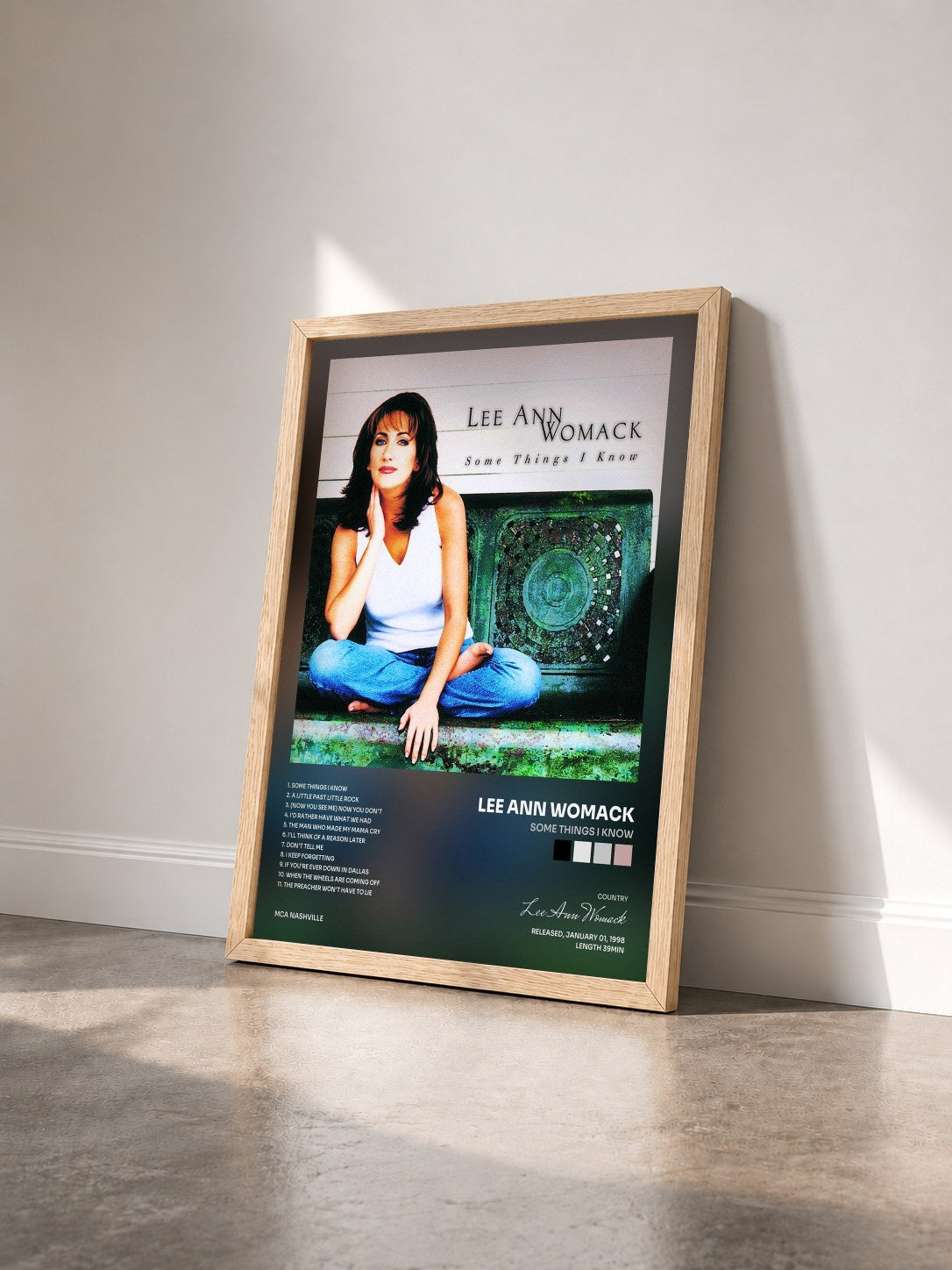 #bois Tableau de l'album Some Things I Know de Lee Ann Womack vu de trois quarts, cadre en bois brut