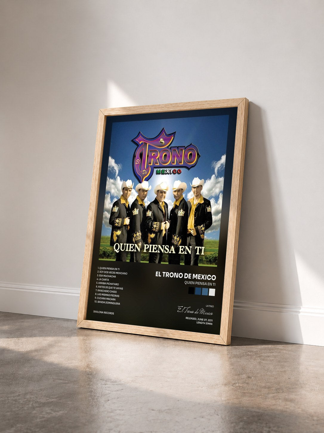 #bois Tableau de l'album Quien Piensa En Ti de El Trono de Mexico vu de trois quarts, cadre en bois brut
