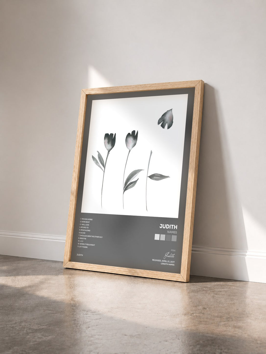 #bois Tableau de l'album Names de Judith vu de trois quarts, cadre en bois brut