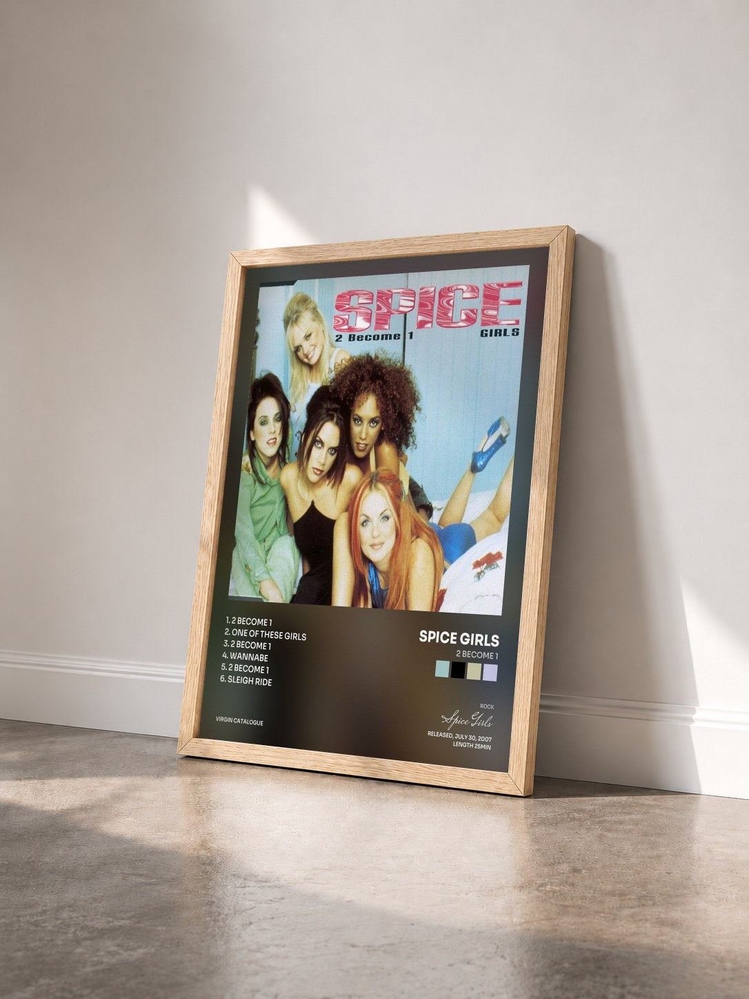 #bois Tableau de l'album 2 Become 1 de Spice Girls vu de trois quarts, cadre en bois brut