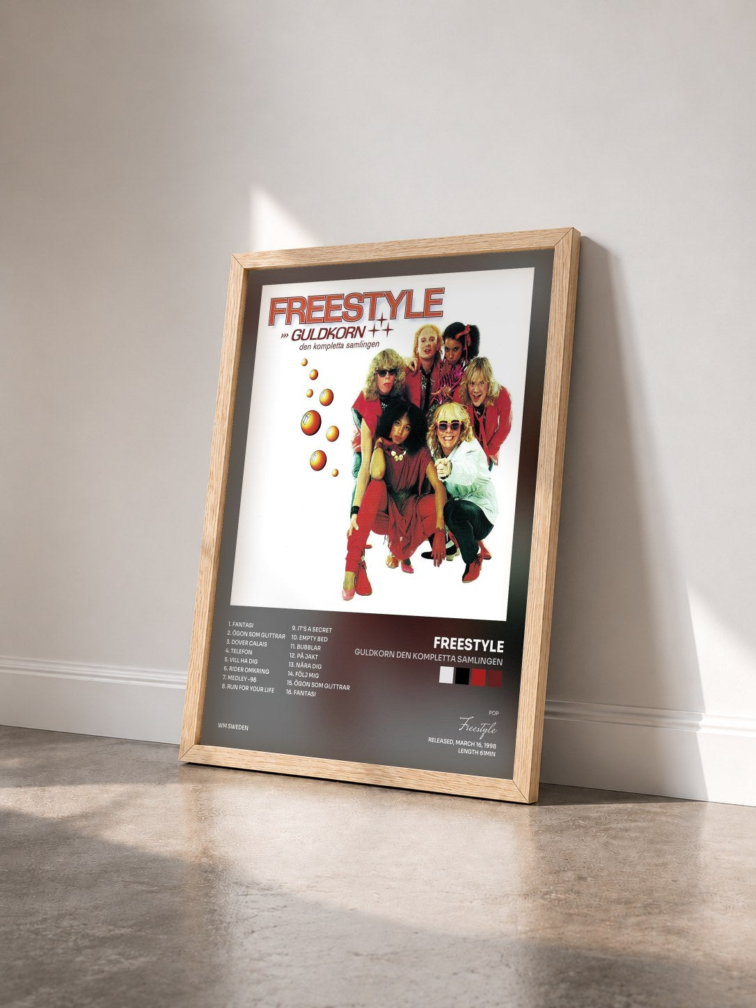 #bois Tableau de l'album Guldkorn Den Kompletta Samlingen de Freestyle vu de trois quarts, cadre en bois brut