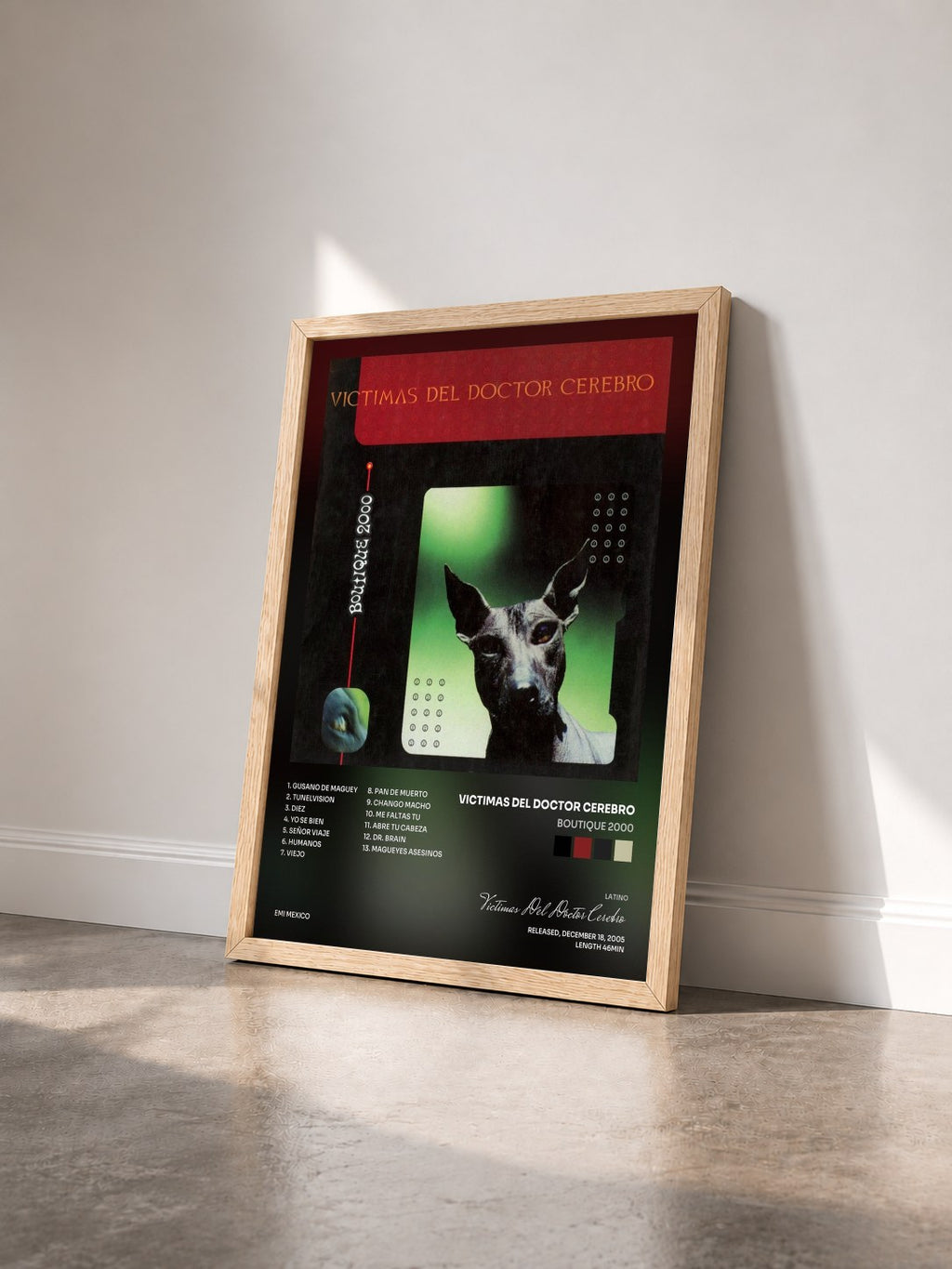 #bois Tableau de l'album Boutique 2000 de Victimas Del Doctor Cerebro vu de trois quarts, cadre en bois brut
