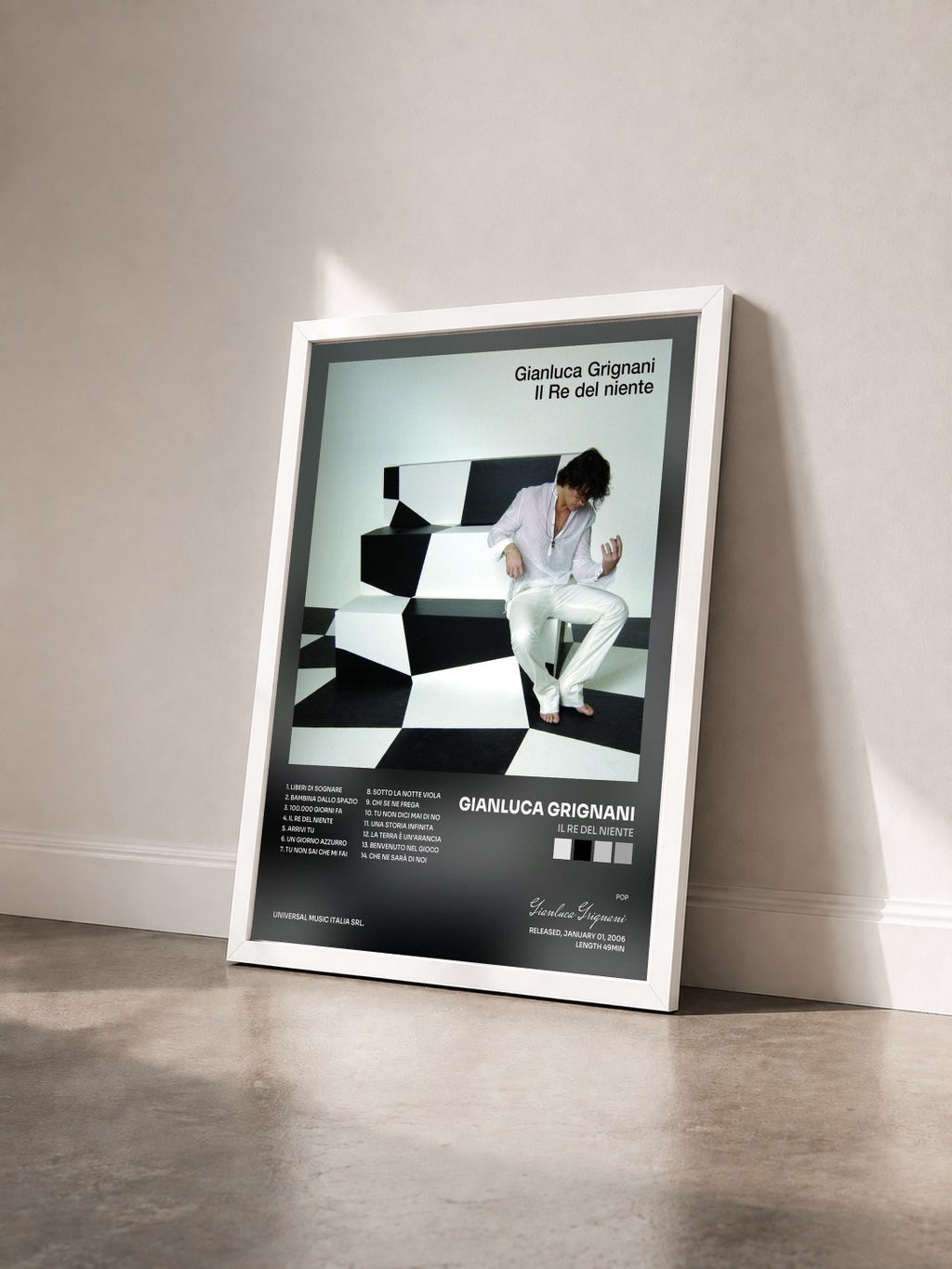 #blanc Tableau de l'album Il Re Del Niente de Gianluca Grignani vu de trois quarts, cadre blanc