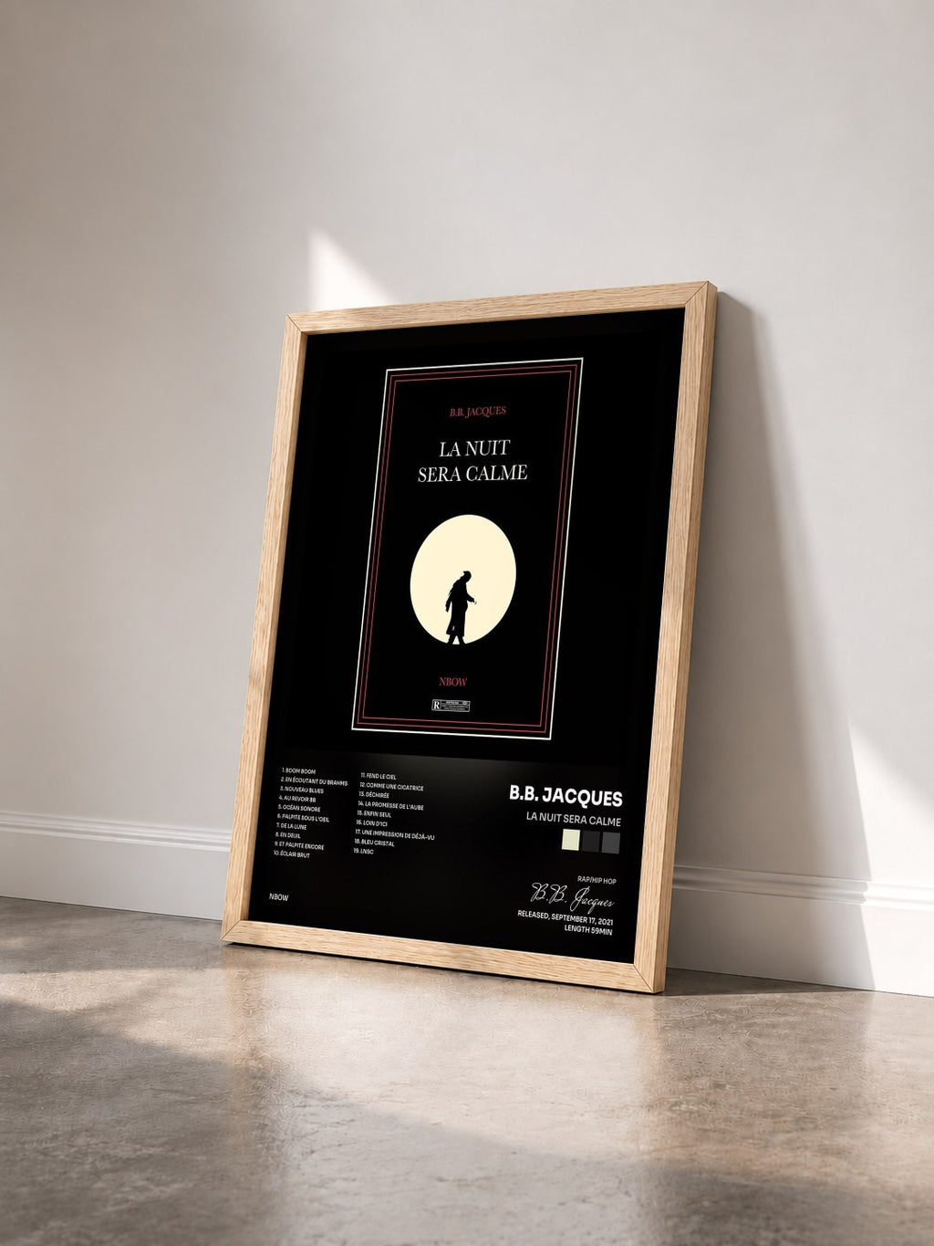 #bois Tableau de l'album La nuit sera calme de B.B. Jacques vu de trois quarts, cadre en bois brut