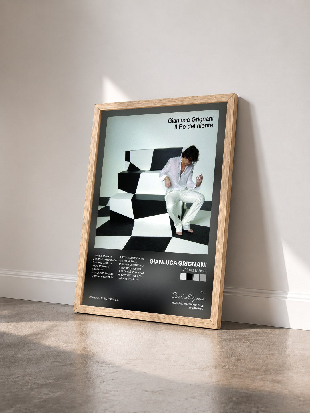 #bois Tableau de l'album Il Re Del Niente de Gianluca Grignani vu de trois quarts, cadre en bois brut