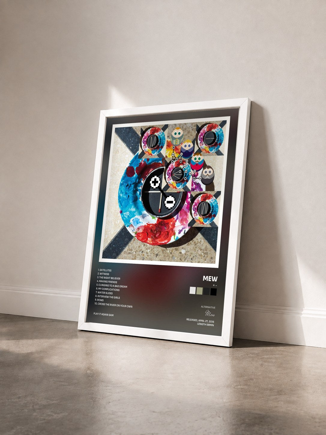 #blanc Tableau de l'album + - de Mew vu de trois quarts, cadre blanc
