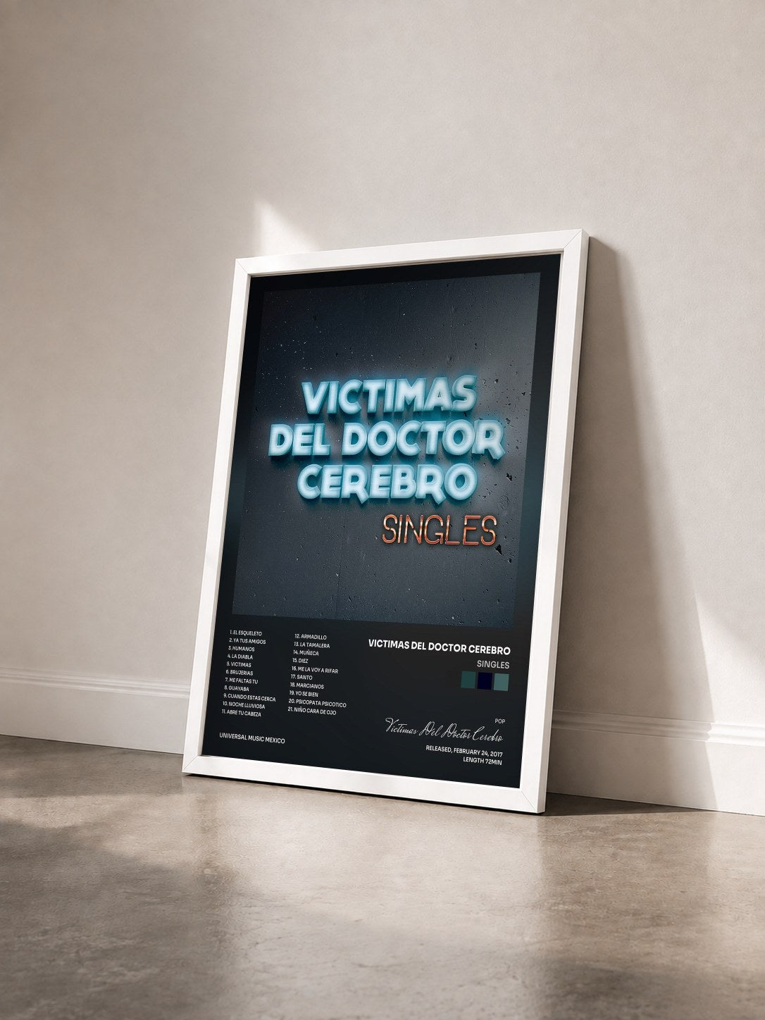 #blanc Tableau de l'album Singles de Victimas Del Doctor Cerebro vu de trois quarts, cadre blanc