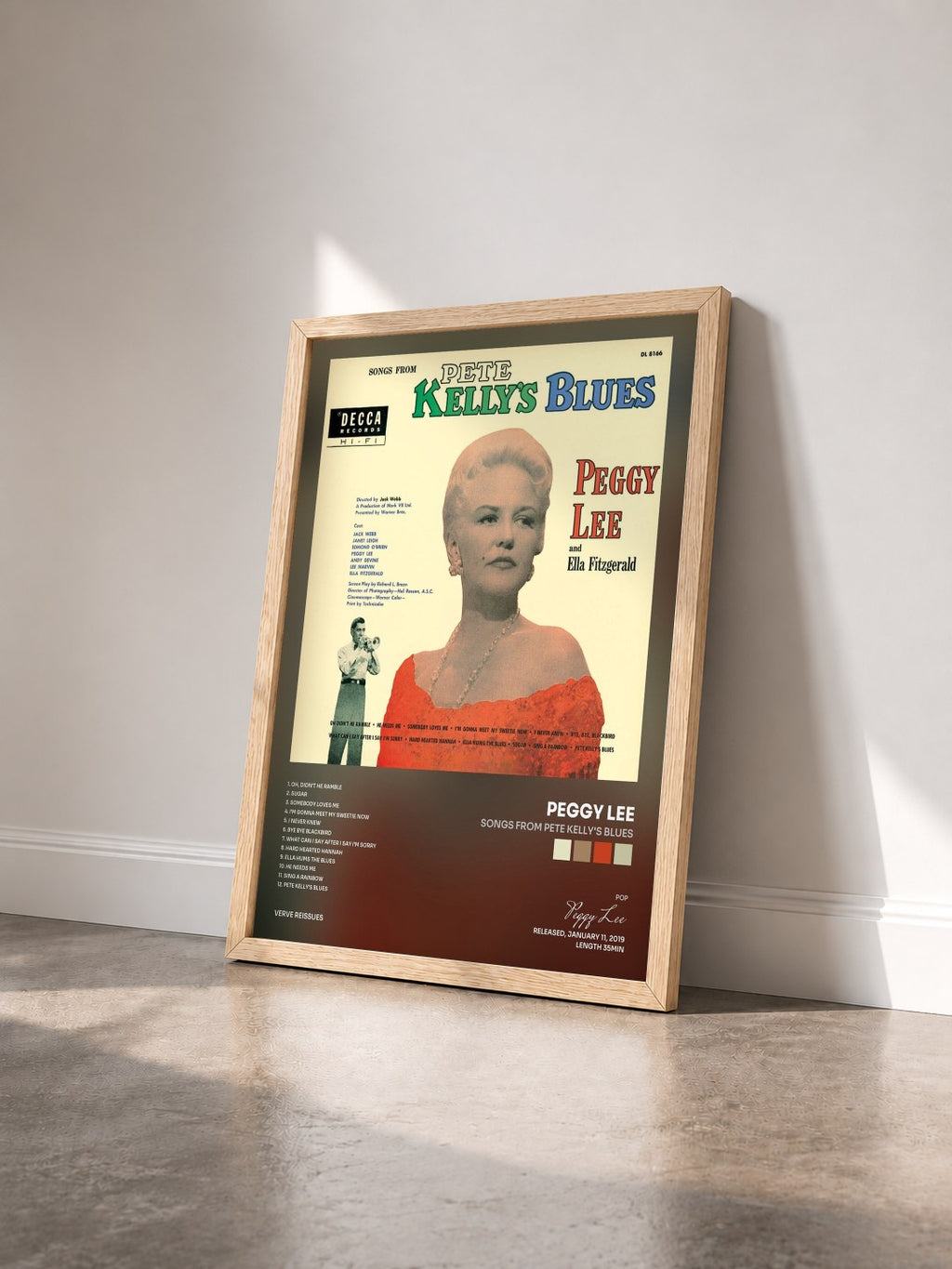 #bois Tableau de l'album Songs From Pete Kelly's Blues de Peggy Lee vu de trois quarts, cadre en bois brut