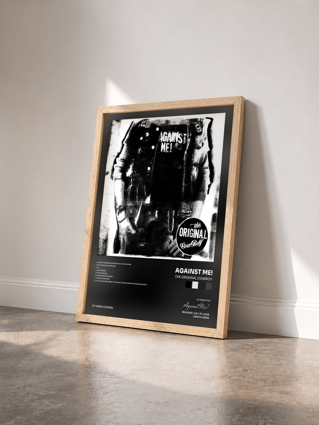 #bois Tableau de l'album The Original Cowboy de Against Me! vu de trois quarts, cadre en bois brut