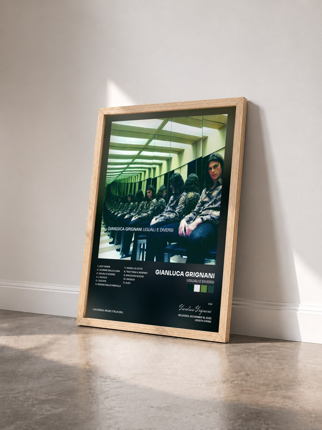 #bois Tableau de l'album Uguali E Diversi de Gianluca Grignani vu de trois quarts, cadre en bois brut