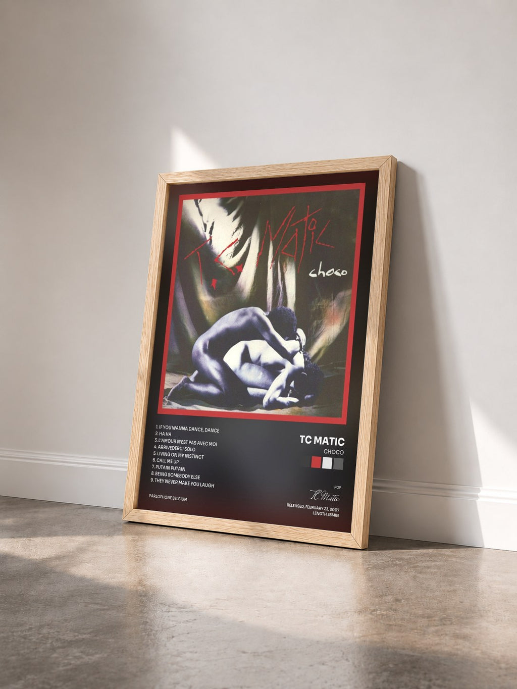 #bois Tableau de l'album Choco de TC Matic vu de trois quarts, cadre en bois brut