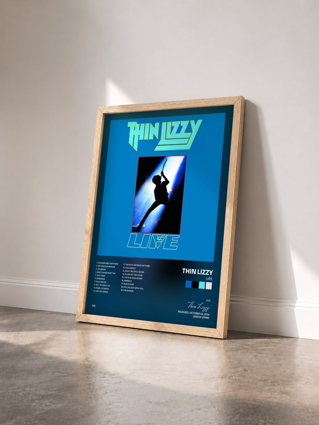 #bois Tableau de l'album Life de Thin Lizzy vu de trois quarts, cadre en bois brut