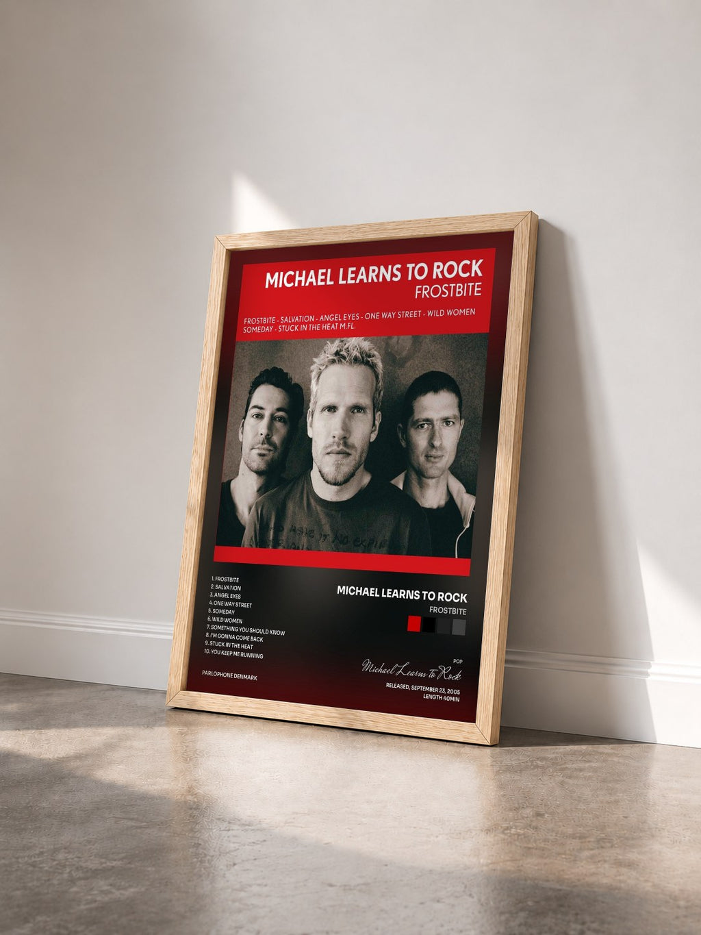 #bois Tableau de l'album Frostbite de Michael Learns to Rock vu de trois quarts, cadre en bois brut