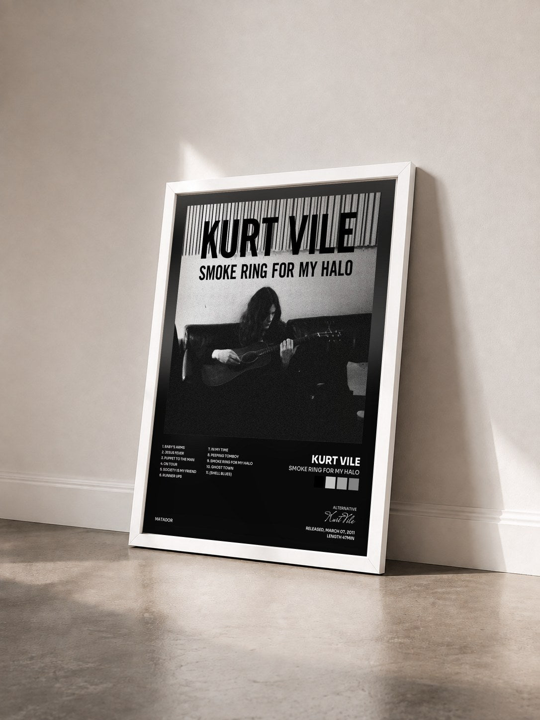#blanc Tableau de l'album Smoke Ring For My Halo de Kurt Vile vu de trois quarts, cadre blanc