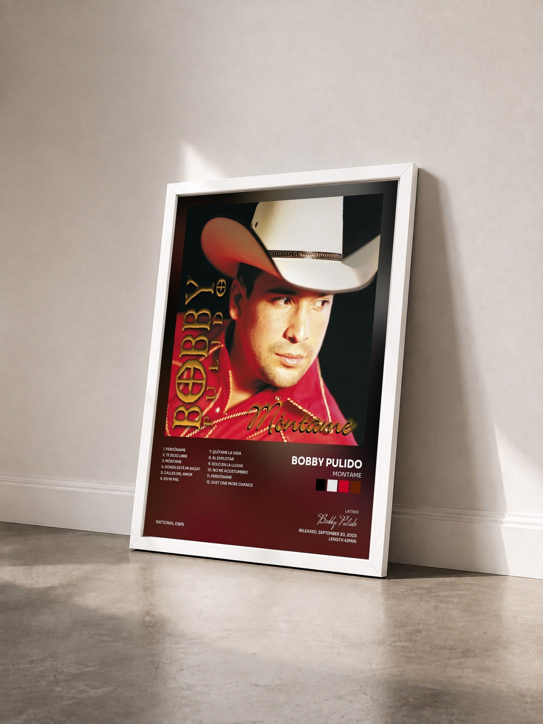 #blanc Tableau de l'album Montame de Bobby Pulido vu de trois quarts, cadre blanc