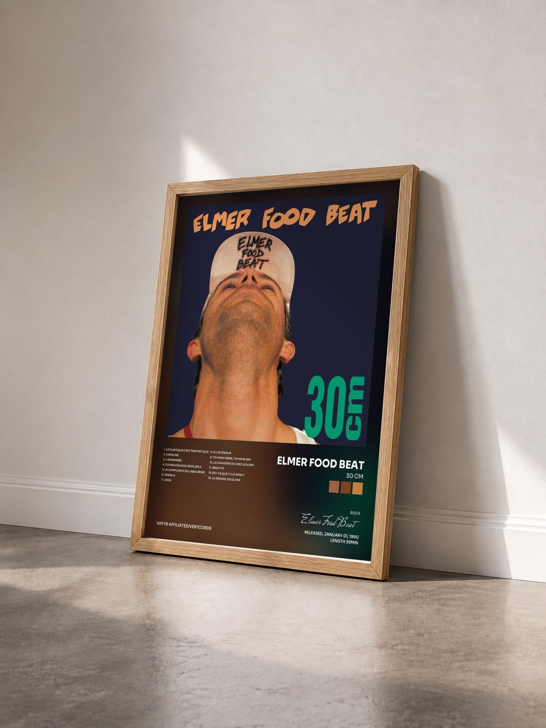 #bois Tableau de l'album 30 cm de Elmer Food Beat vu de trois quarts, cadre en bois brut