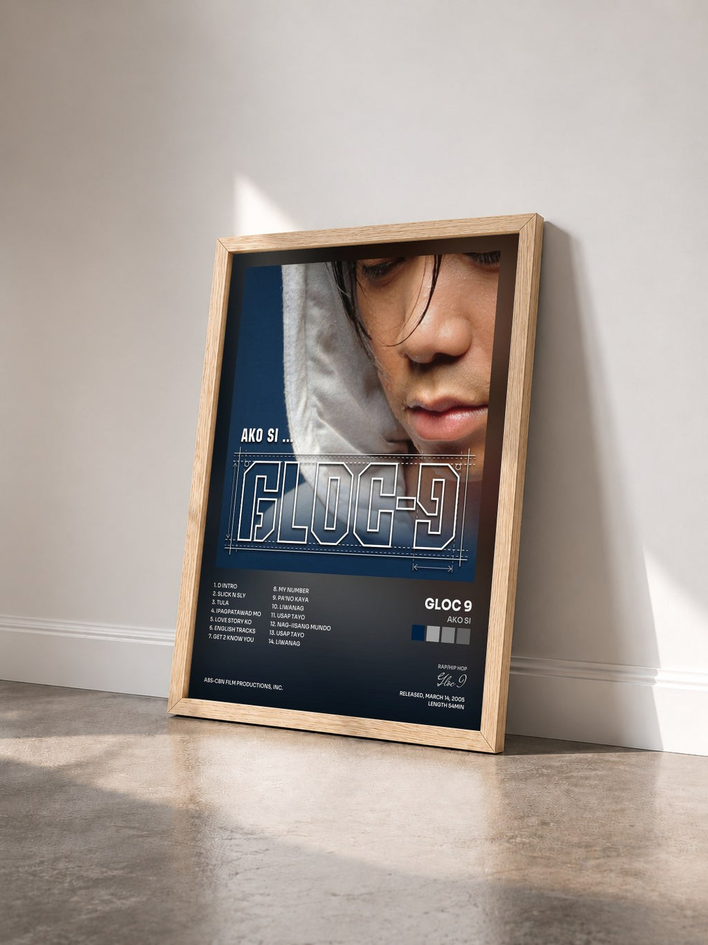 #bois Tableau de l'album Ako Si de Gloc 9 vu de trois quarts, cadre en bois brut
