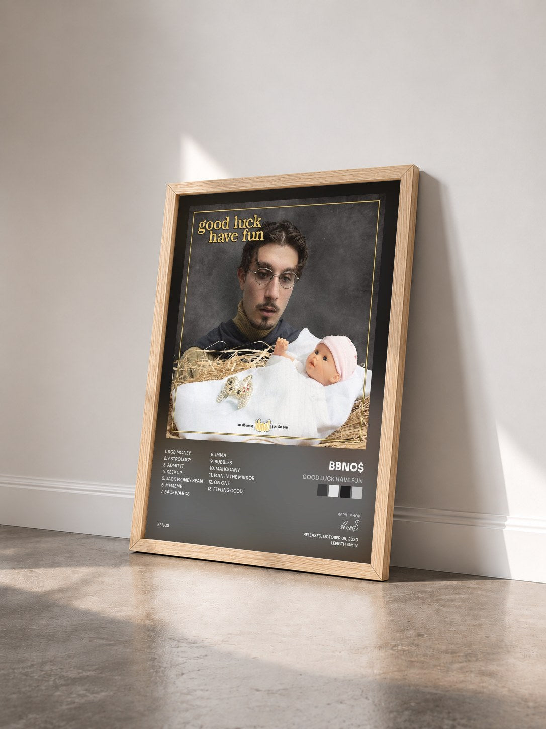 #bois Tableau de l'album good luck have fun de bbno$ vu de trois quarts, cadre en bois brut