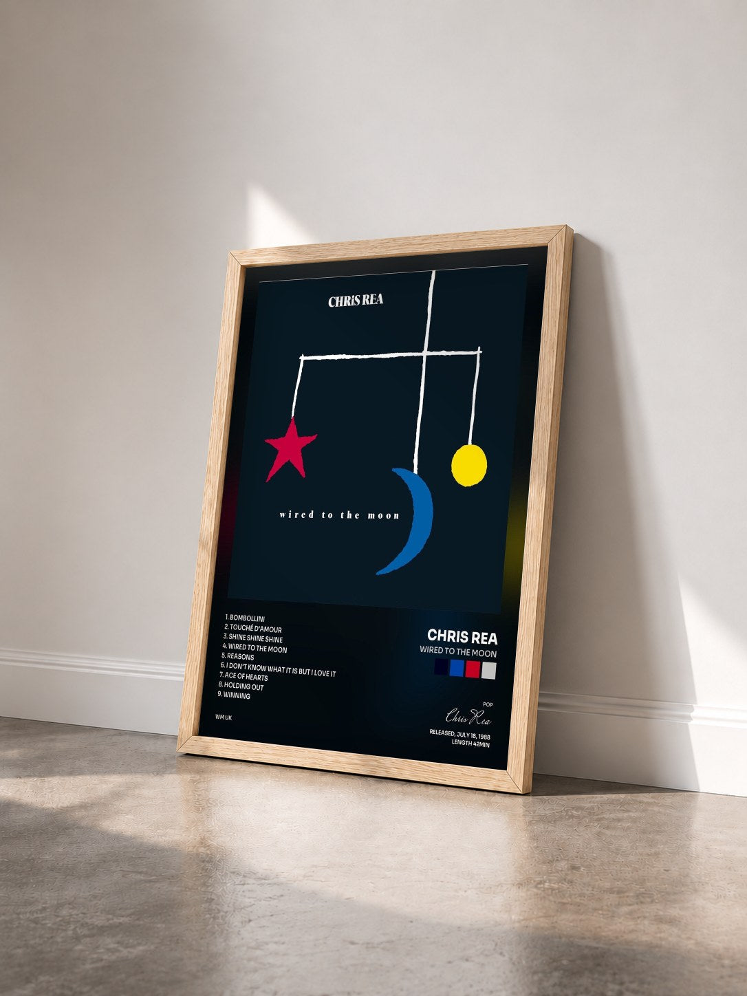 #bois Tableau de l'album Wired to the Moon de Chris Rea vu de trois quarts, cadre en bois brut