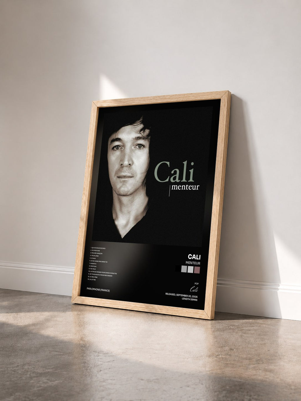 #bois Tableau de l'album Menteur de Cali vu de trois quarts, cadre en bois brut