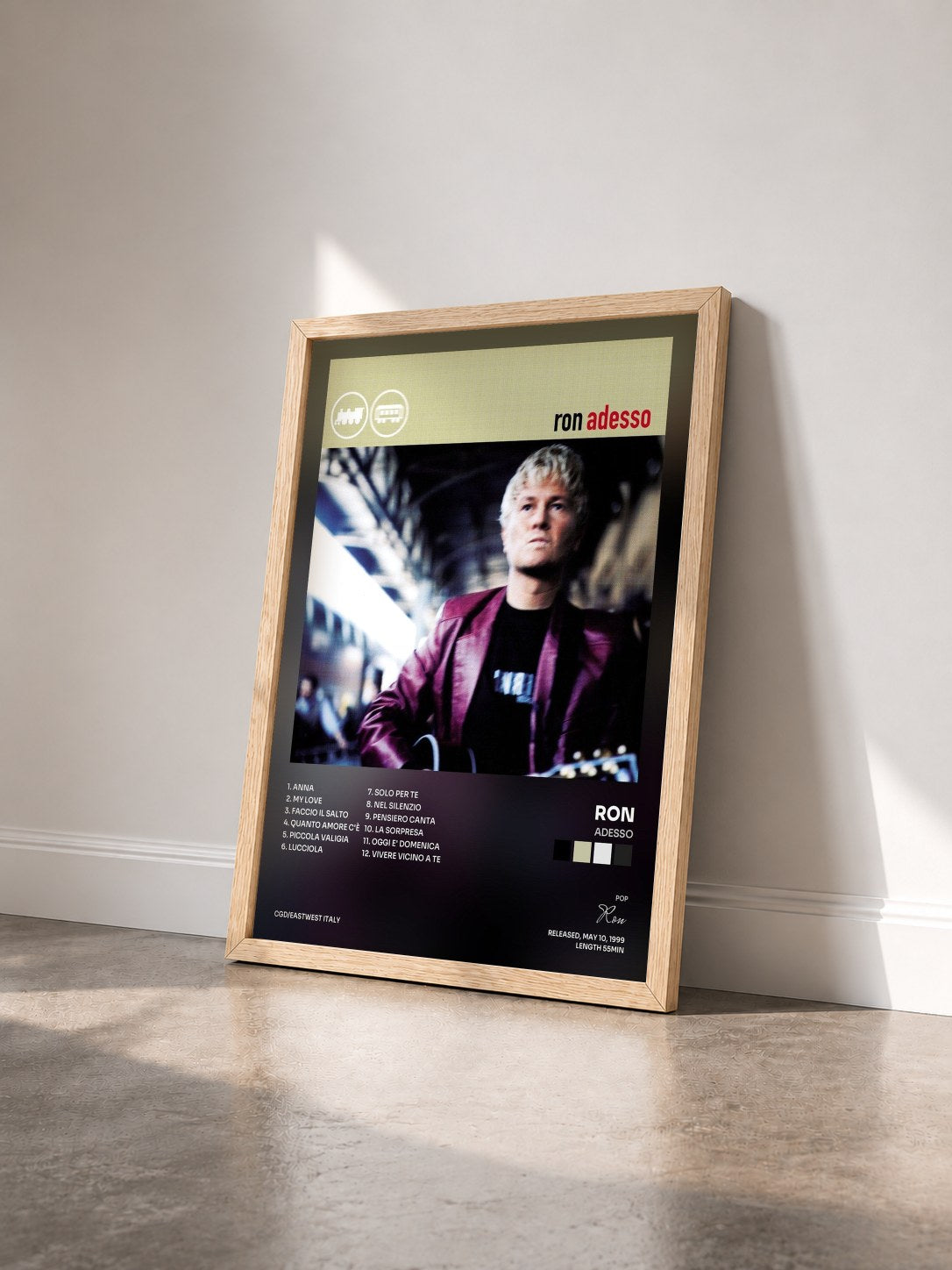 #bois Tableau de l'album Adesso de Ron vu de trois quarts, cadre en bois brut