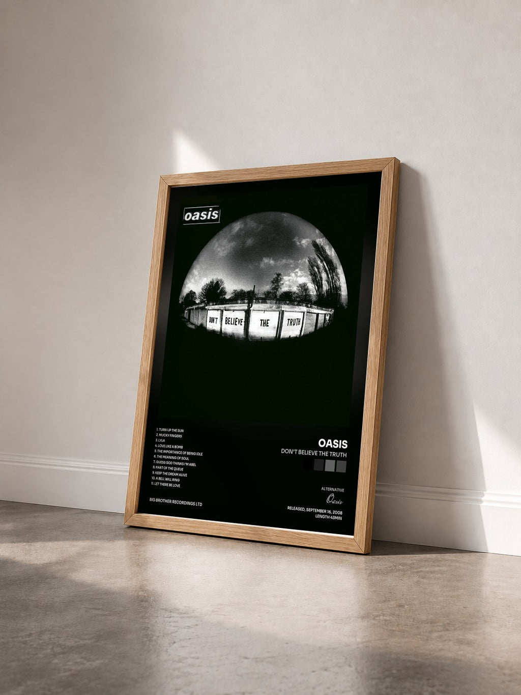 #bois Tableau de l'album Don't Believe The Truth de Oasis vu de trois quarts, cadre en bois brut